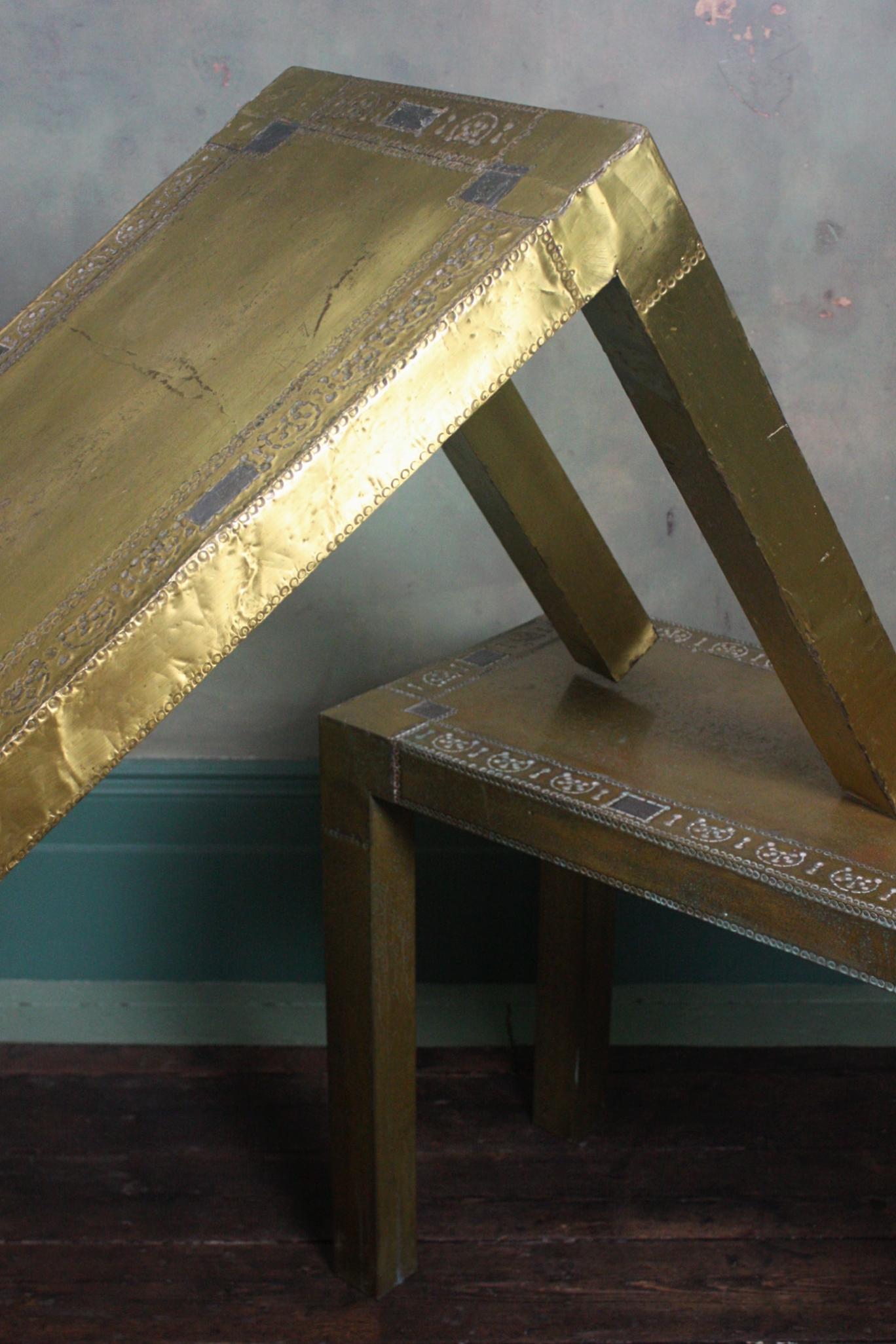 A fine pair of brass console tables by Rodolfo Dubarry 

Originally from Argentina, he moved to Spain in the 1967 and soon after his Sister followed and they have been working together since. They have worked around the world and notably produced
