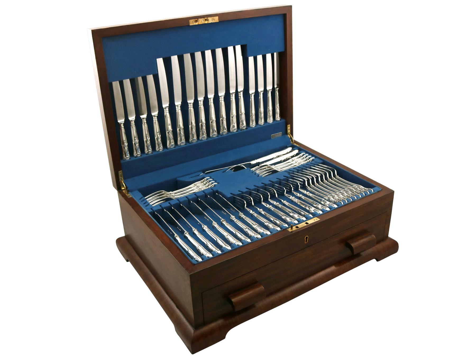 An exceptional, fine and impressive vintage Elizabeth II English sterling silver straight King's pattern flatware service for eight persons; an addition to our canteen of cutlery collection.

The pieces of this exceptional, vintage Elizabeth II