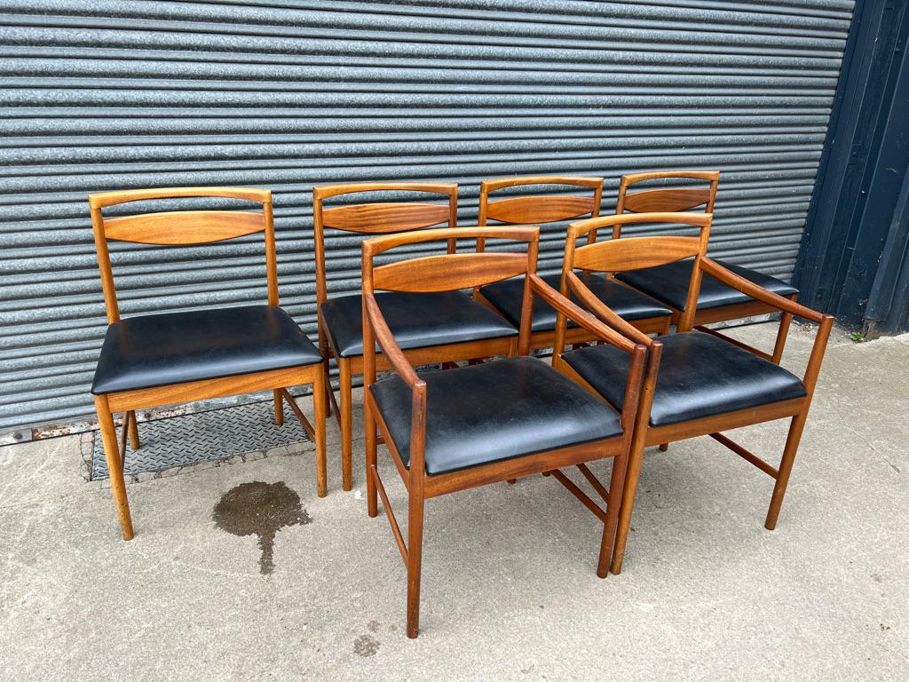 Stunning set of teak 1960 / 1970's vintage retro Chairs, McIntosh made and designed chairs, one of the best period furniture makers from the 1960s!! the chairs are upholstered in the original black vinyl which is in very good condition without any