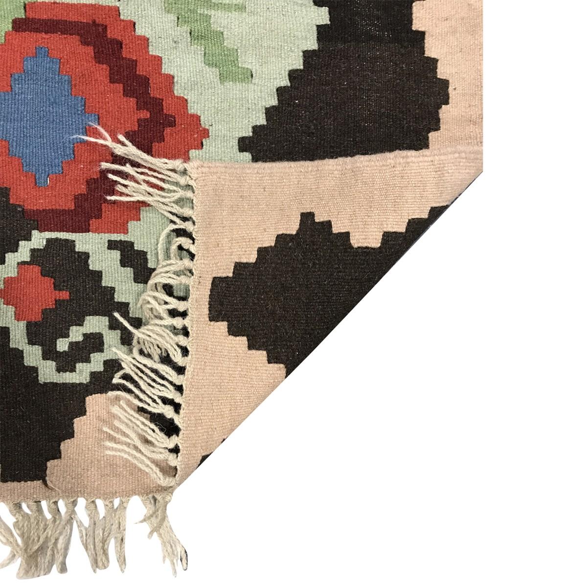 One-of-a kind vintage and antique Ghelims rugs, from Afghanistan, Turkey, Iran, Eastern and Central Asia. These historic rugs, woven between 1890 and 1950, have a contemporary flair for color, alongside their transitional and tribal patterns. Each
