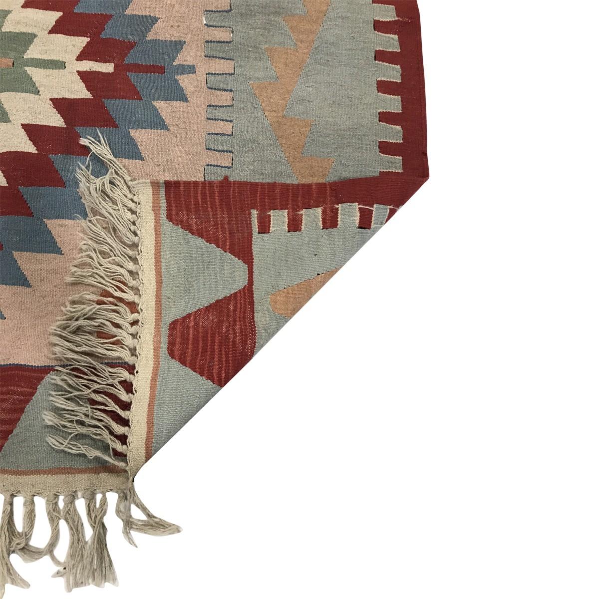 One-of-a kind vintage and antique Ghelims rugs, from Afghanistan, Turkey, Iran, Eastern and Central Asia. These historic rugs, woven between 1890 and 1950, have a contemporary flair for color, alongside their transitional and tribal patterns. Each