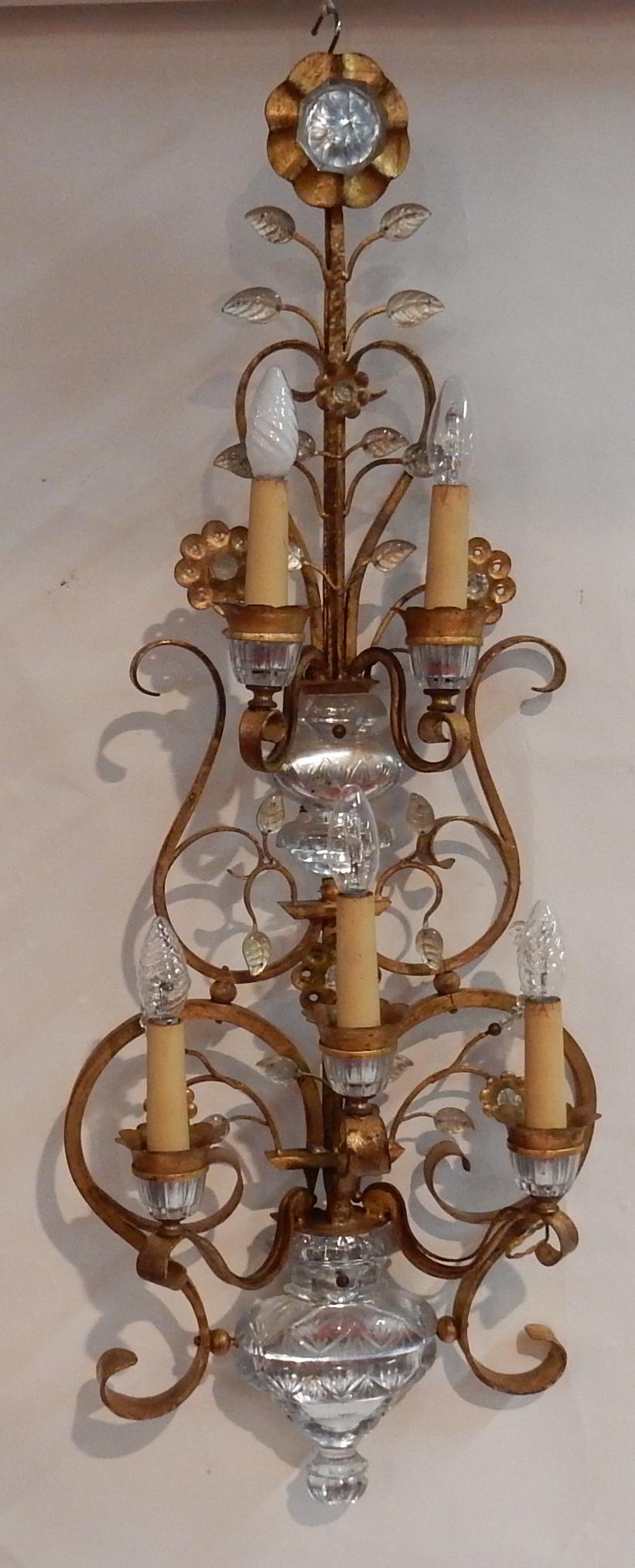 patina iron wall lamp decorated with crystal or glass. Urn and leaf decoration
Maison Banci
Circa 1970
Good condition

Measures: Length : 104 cm
Width : 40 cm
Depth : 16 cm.