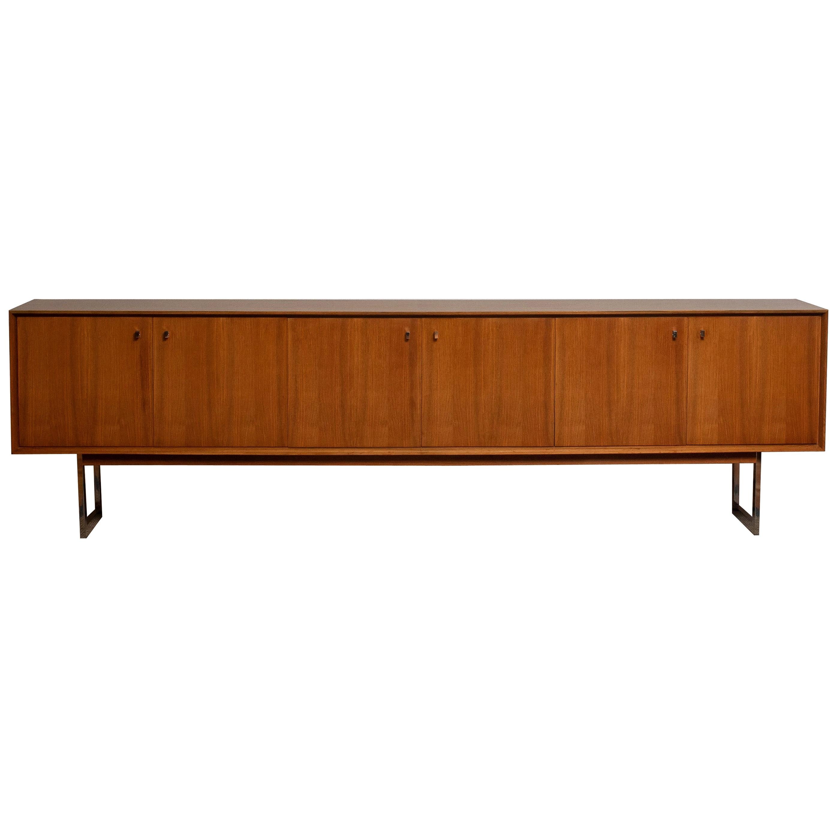 Extreme beautiful and extra wide credenzas / sideboard, 118 inches, in walnut on chrome legs.
It's a great quality piece and the overall condition is very good!
  