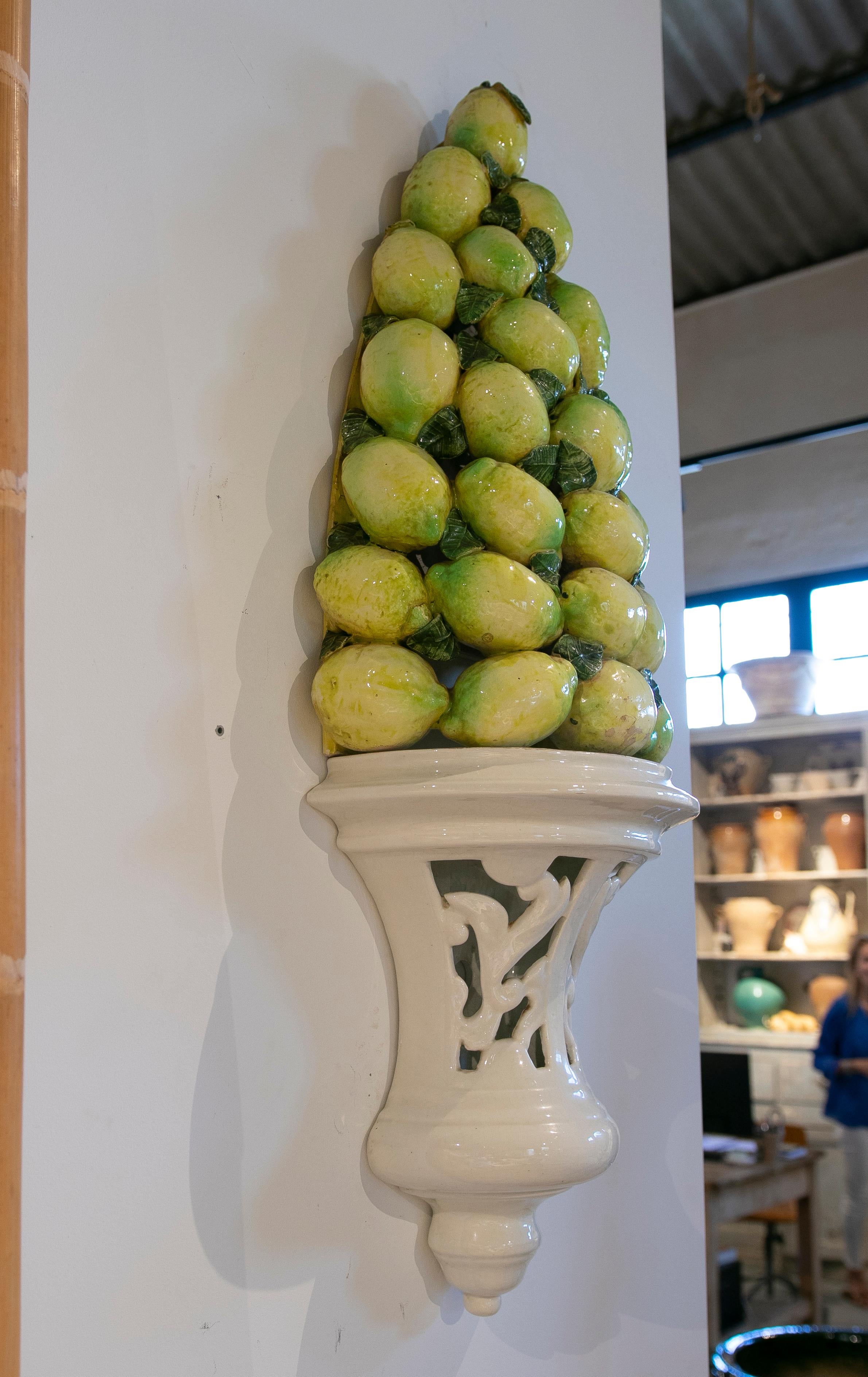 1970a pair of ceramic Handpainted Wall Lamps with a Lemon Stack Design.