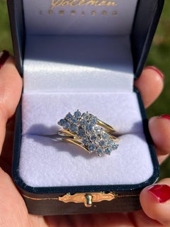 1970s  1.00 TCW Diamond and 18k Two Tone Gold Waterfall Cluster Ring
