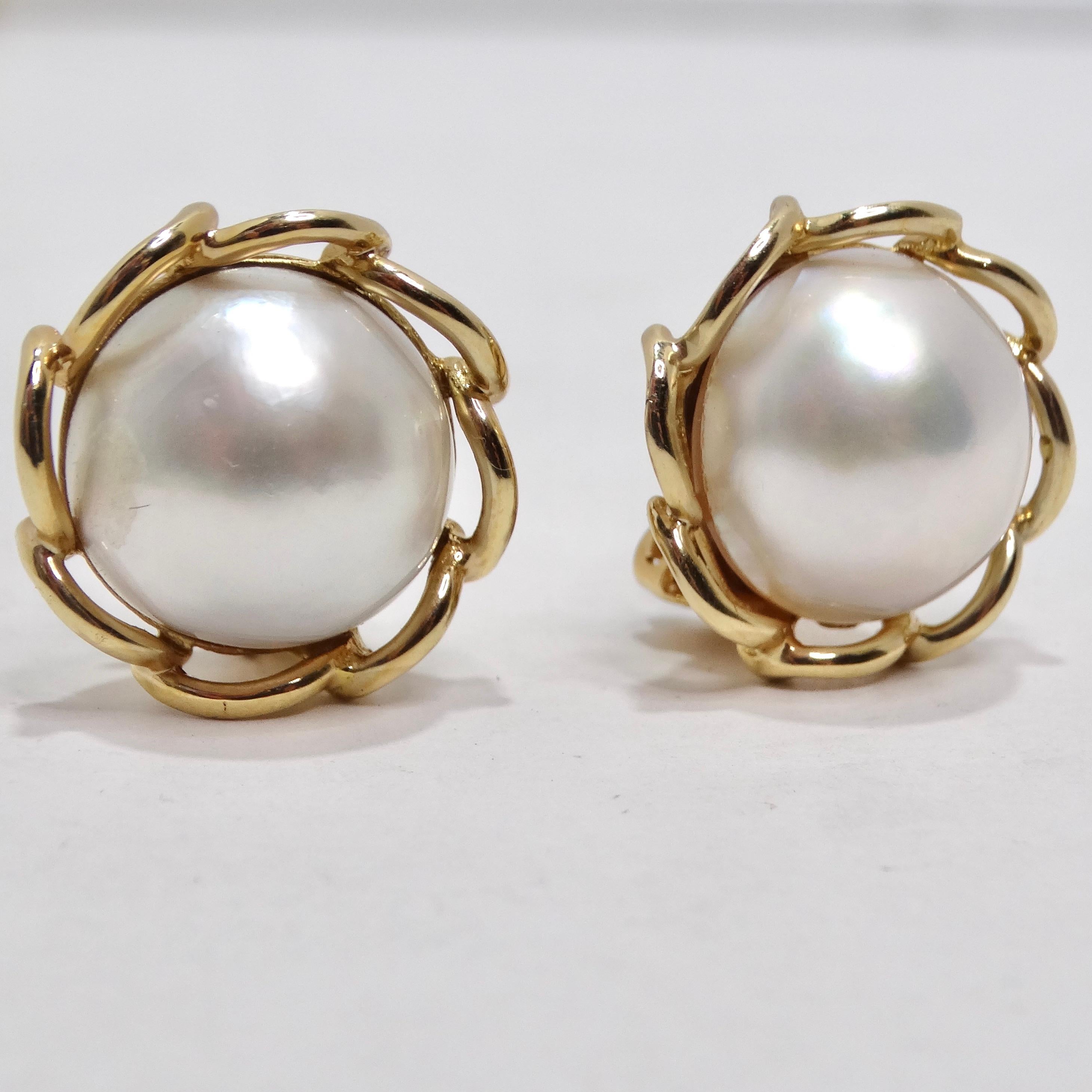 Introducing a pair of vintage earrings that embody the essence of timeless beauty and sophistication. The 1970s 14K Gold Pearl Clip-On Stud Earrings are a symbol of classic elegance, perfect for those who appreciate the enduring allure of vintage