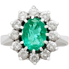 1970s 1.50 Carat Emerald and 1.12 Carat Diamond Gold Cluster Ring