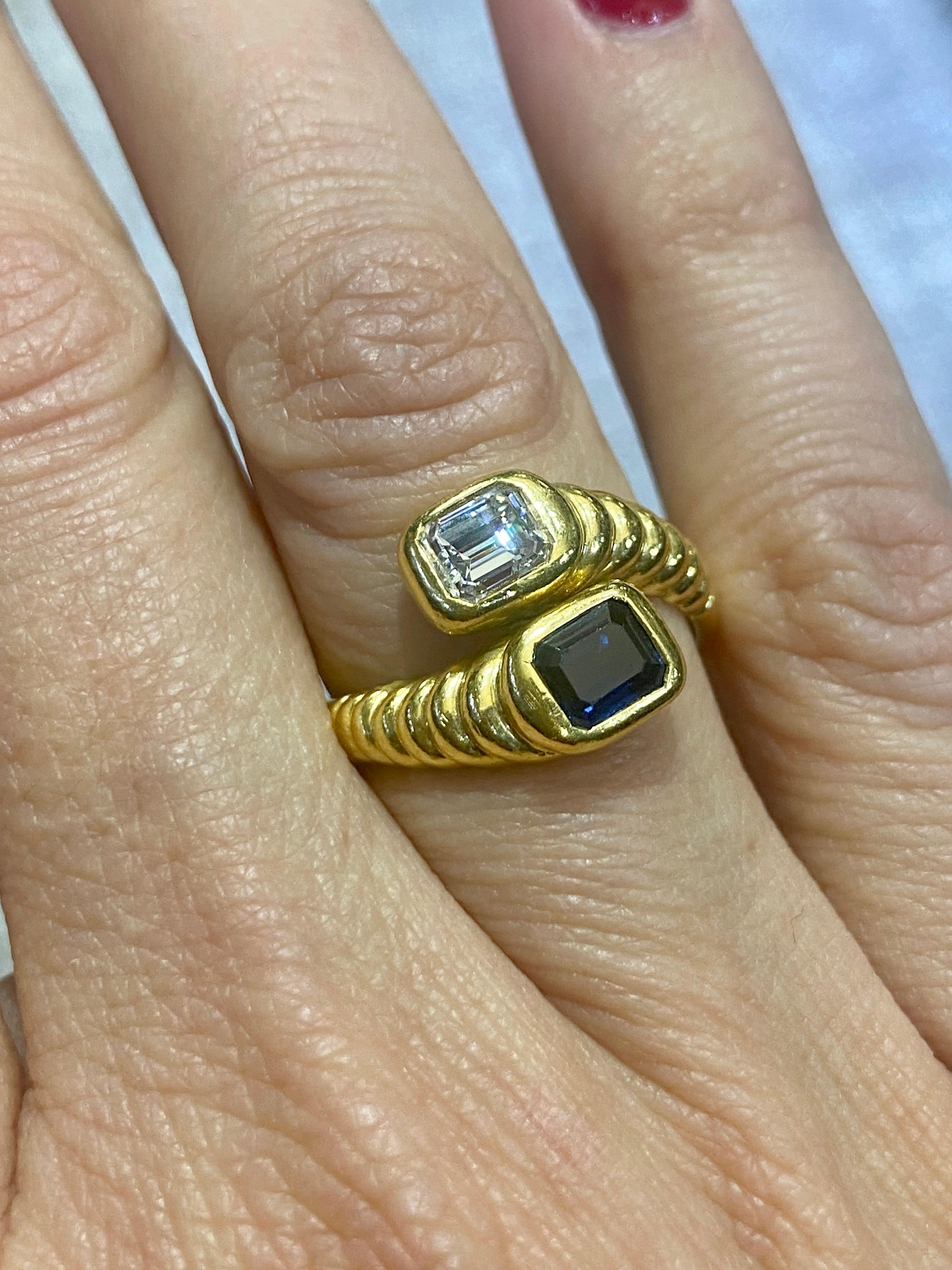 Contemporary 1970s 18 k gold and emerald cut diamond and sapphire toi et moi ring For Sale