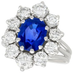 Retro 1970s 1.84 Carat Oval Cut Burmese Sapphire and 2.35 Carat Diamond Cluster Ring