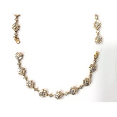 1970s 18 Carat Yellow Gold Diamond Bracelet and Necklace Set
