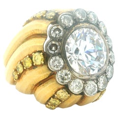 1970s 18K Gold Bombe Ring with White Sapphire, Diamonds 
Yellow Sapphires