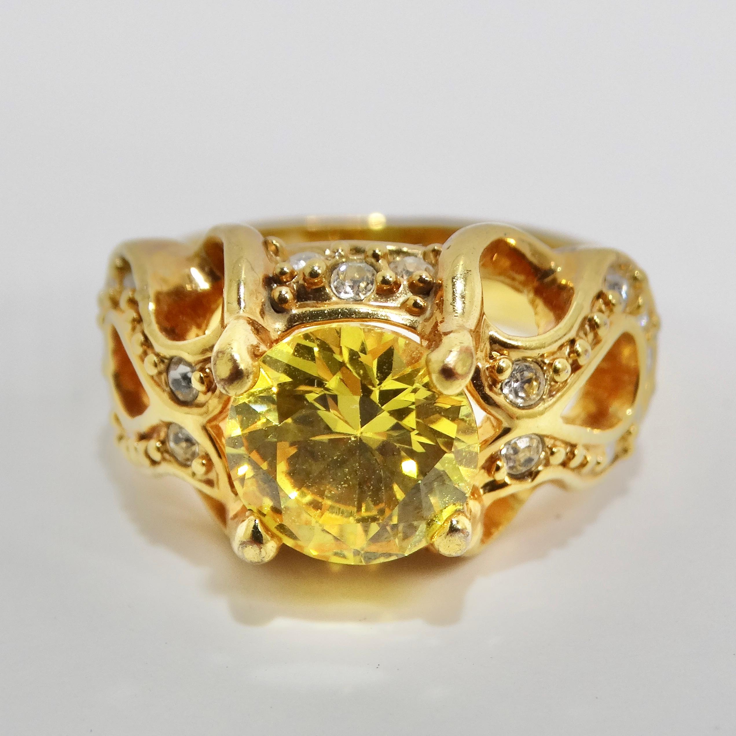 Step into the captivating world of the 1970s with our exquisite 18K Gold Plated Synthetic Yellow Diamond Ring. This vintage-inspired masterpiece showcases a whimsical design, featuring synthetic clear diamonds that dance along the band and culminate