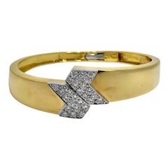 1970s 18K Yellow Gold Bypass Bangle Bracelet with Diamond Encrusted Tips