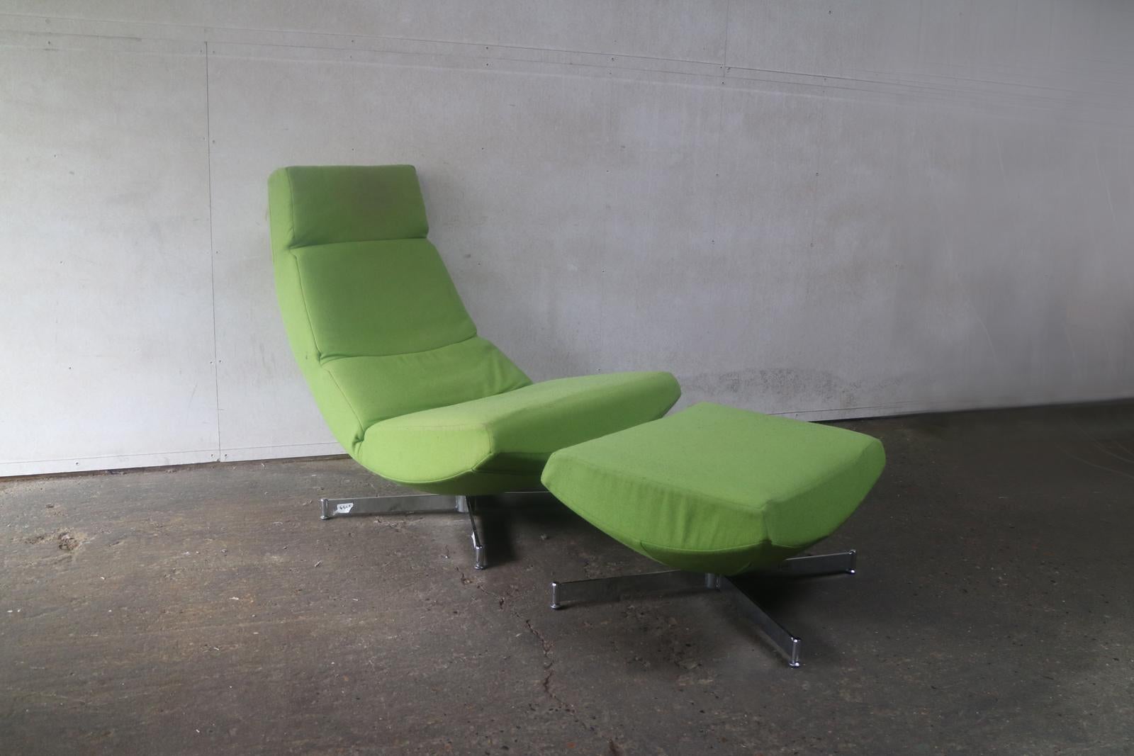 A very striking late 1970s-early 1980s linear shaped sloping lounge chair with matching footstool. Upholstered in the original very bright lime green woollen material.
A real statement piece.

 
