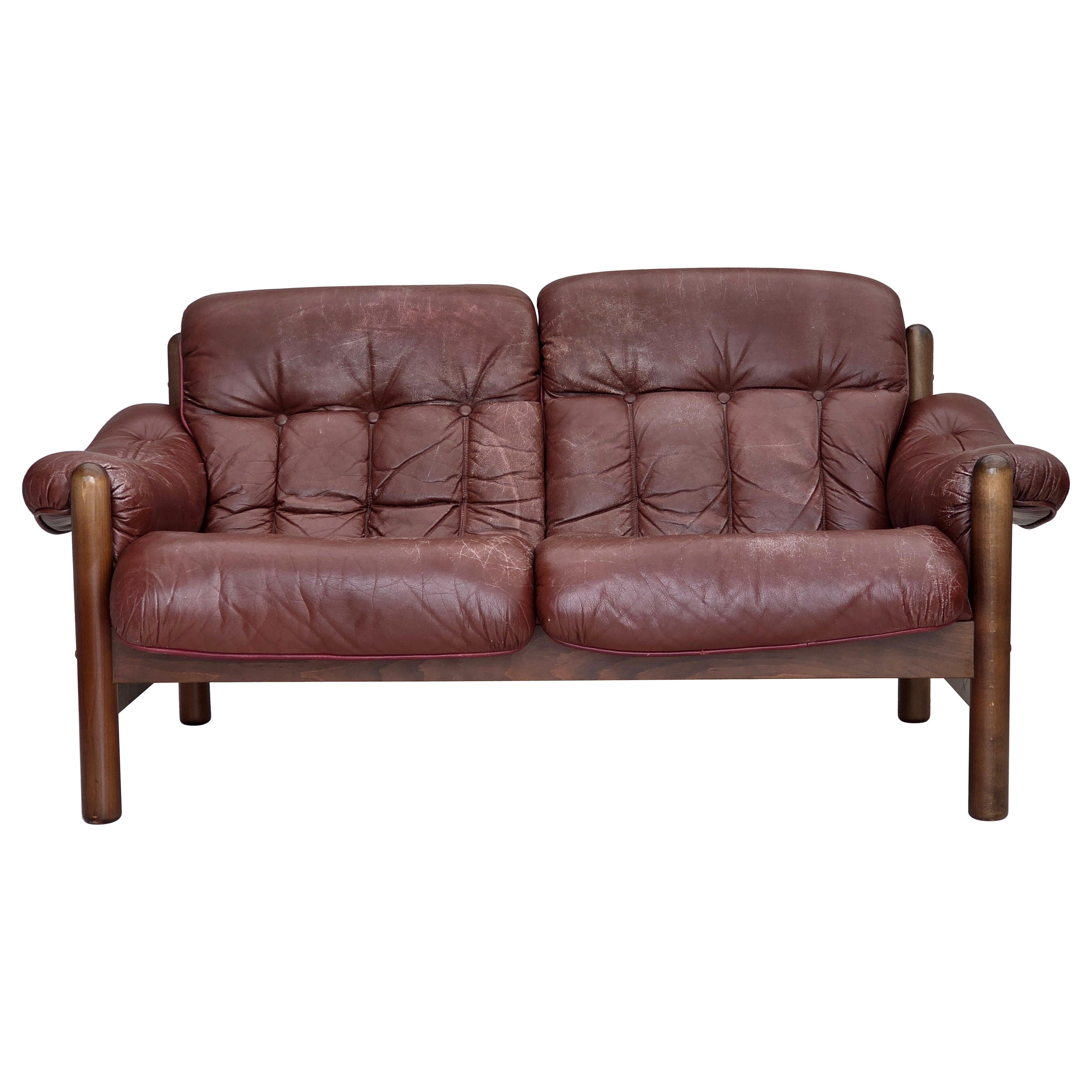 1970s, 2-seater Swedish sofa, brown leather with patina, dark beech wood. For Sale