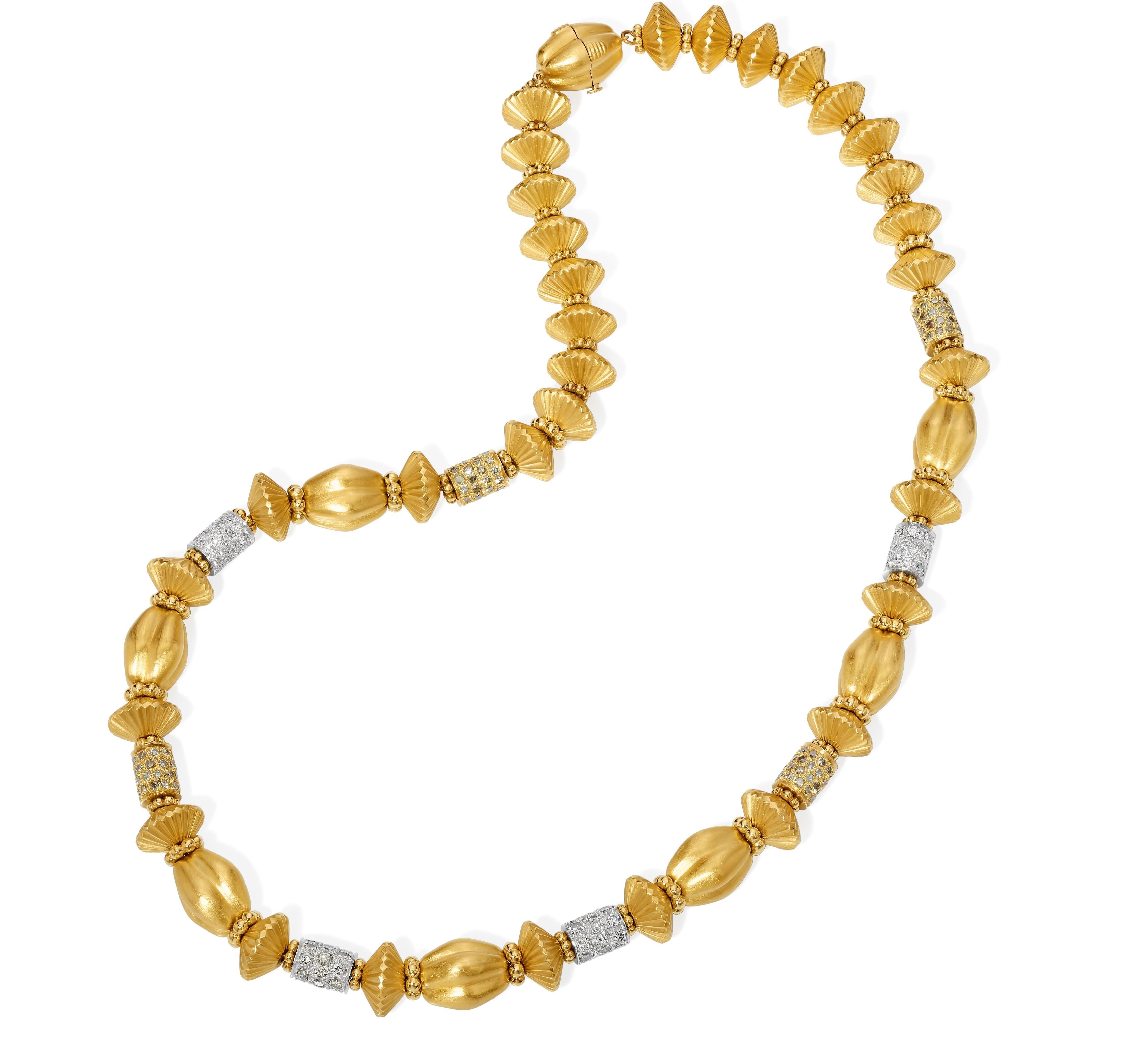 From the Eiseman Estate Jewelry Collection, 22 karat yellow gold yellow and white diamond rondel necklace. This necklace is crafted with 96 pave set round brilliant cut diamonds with a total combined weight of 4.80 carats. These diamonds have H-I