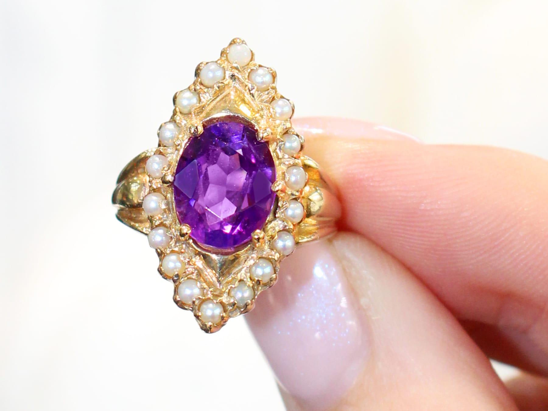 Oval Cut 1970s, 2.51 Carat Amethyst and Seed Pearl Yellow Gold Cocktail Ring For Sale