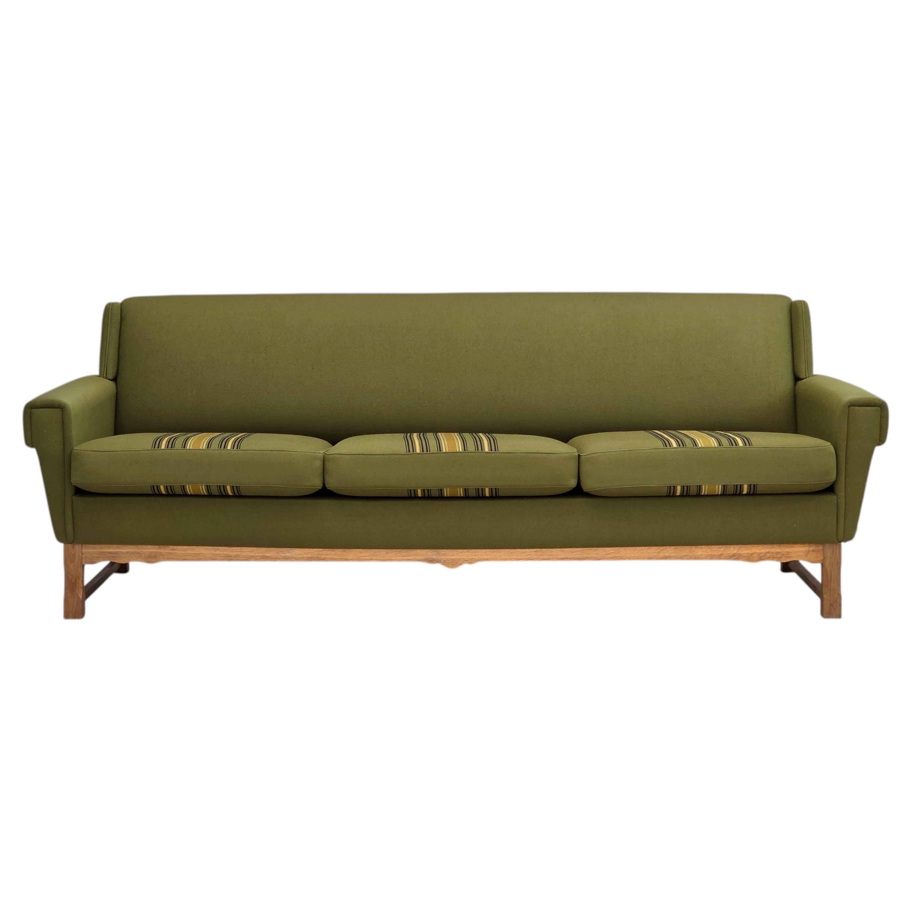 1970s, 3-seater Danish sofa, green furniture wool, oak wood.