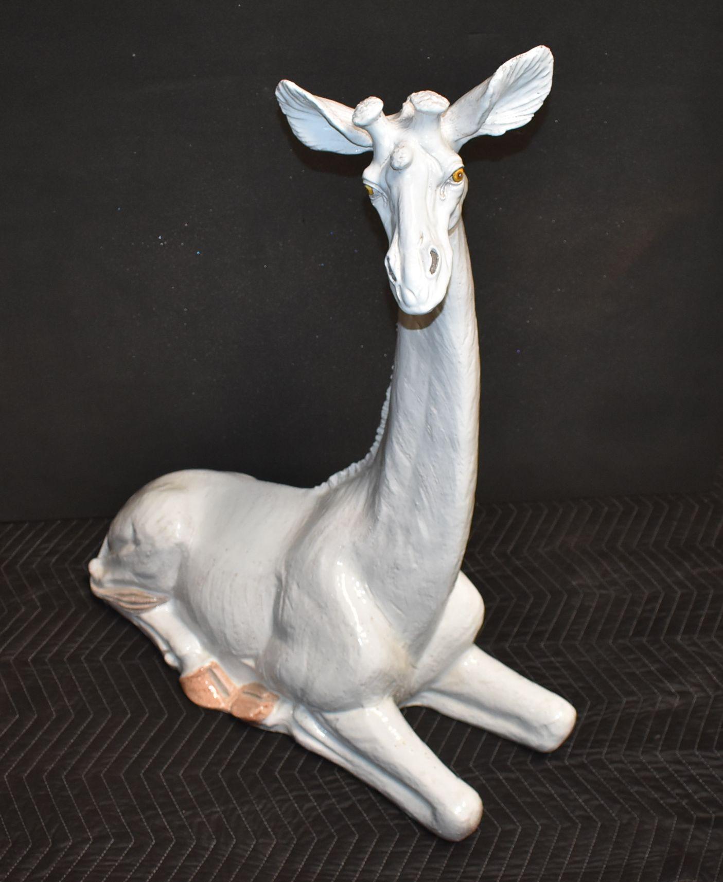 Italian white ceramic glazed on terracotta with hand painted details giraffe sculpture. Marked Italy, circa 1970s.

 