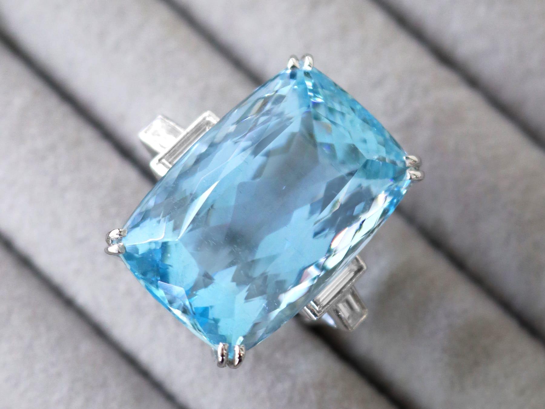 A stunning vintage 45.09 carat aquamarine and 0.96 carat diamond, 18 karat white gold cocktail ring; part of our diverse gemstone jewelry and estate jewelry collections.

This stunning, fine and impressive vintage aquamarine ring has been crafted in