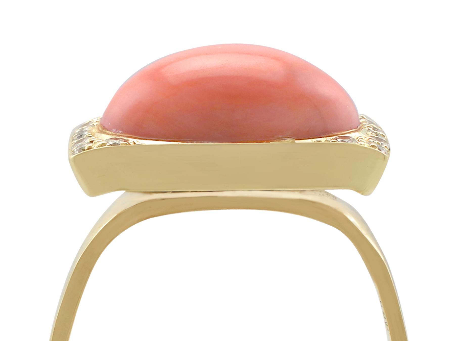 An impressive vintage 5.27 carat pink coral and 0.20 carat diamond, 14 karat yellow gold dress ring; part of our diverse gemstone jewellery and estate jewelry collections.

This fine and impressive pink coral and diamond ring has been crafted in 14k
