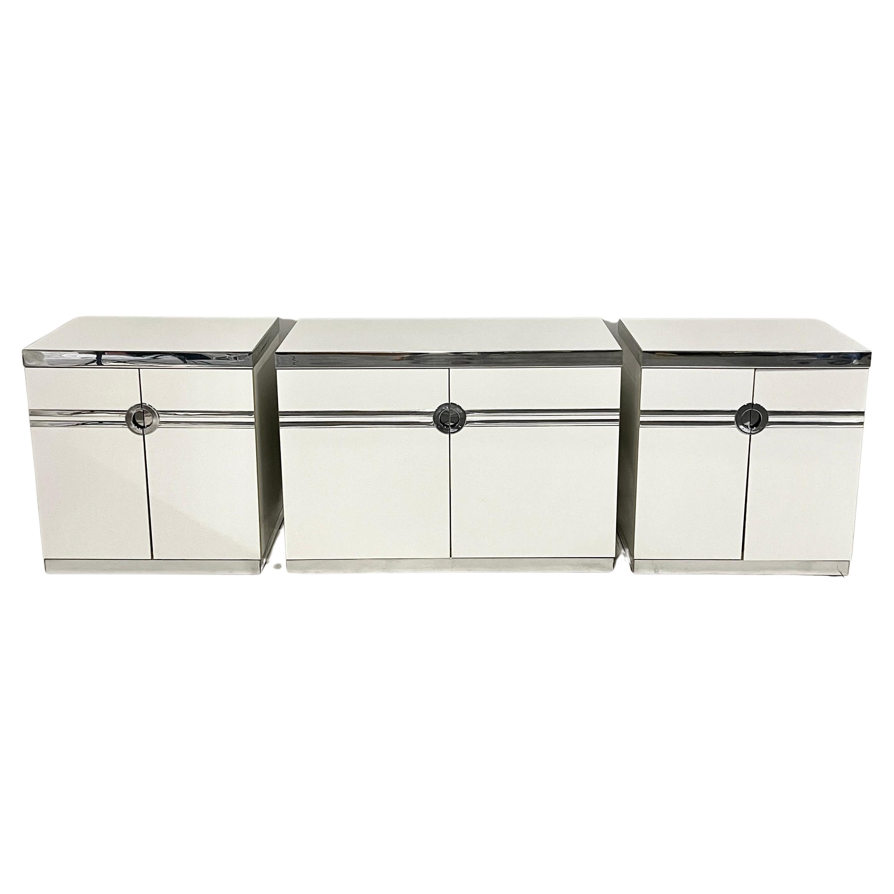 Stunning and sturdy three part credenza or dresser which consists of a pair of Pierre Cardin designed nightstands with a separate 40