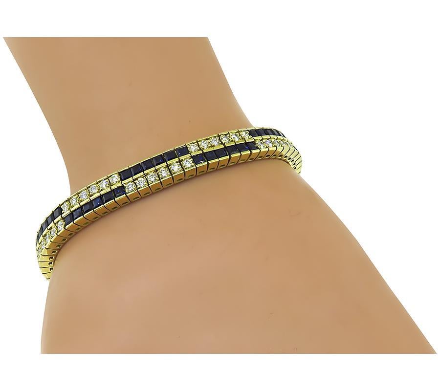 This is an elegant 18k yellow gold bracelet. The bracelet is set with lovely square cut sapphires that weigh approximately 8.49ct. The sapphires are accentuated by sparkling round cut diamonds that weigh approximately 2.66ct. The color of these