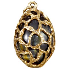 1970s 9 Carat Yellow Gold Caged Tigers Eye Egg Pendant