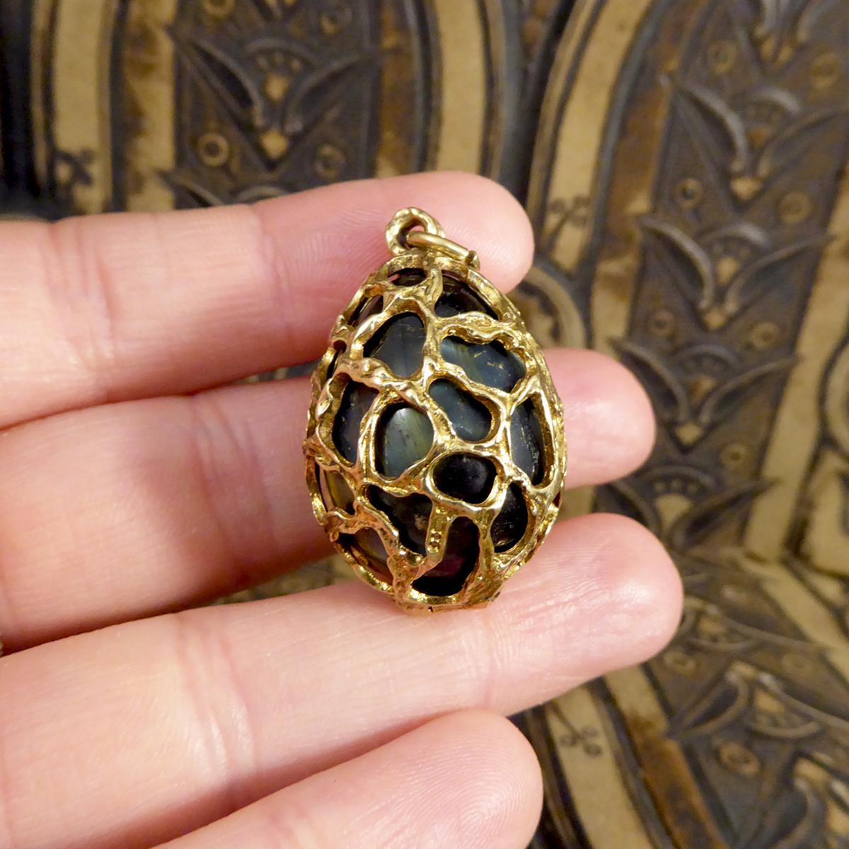 Women's or Men's 1970s 9 Carat Yellow Gold Caged Tigers Eye Egg Pendant