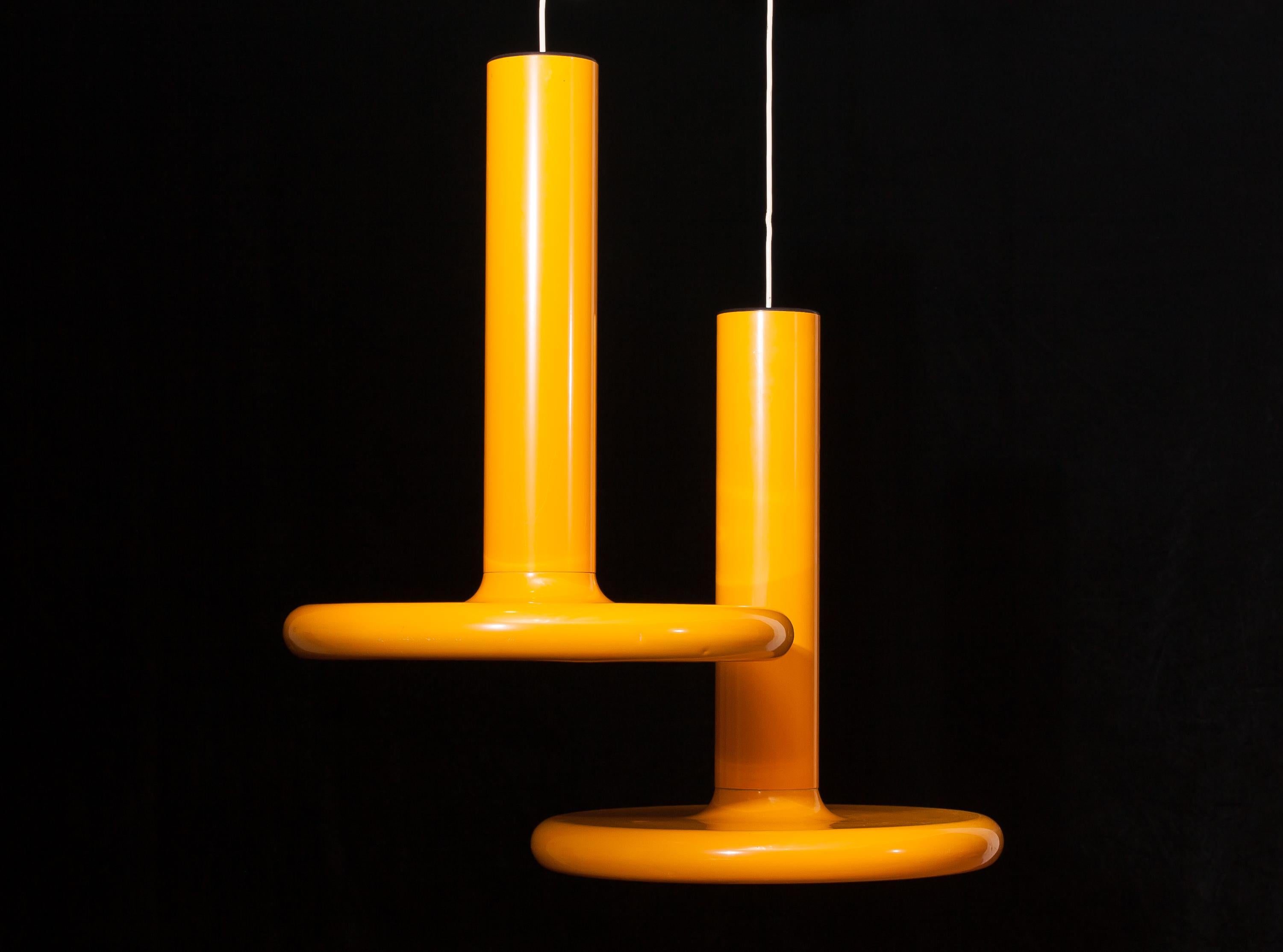 A pair of very rare and large pendants/ceiling lights.
These enormous pendants are yellow lacquered and in the bottom inside they are yellow-white.
They are made of metal.
It is a beautiful set!
Period 1970s
Dimensions: H 75 cm, ø 60 cm.