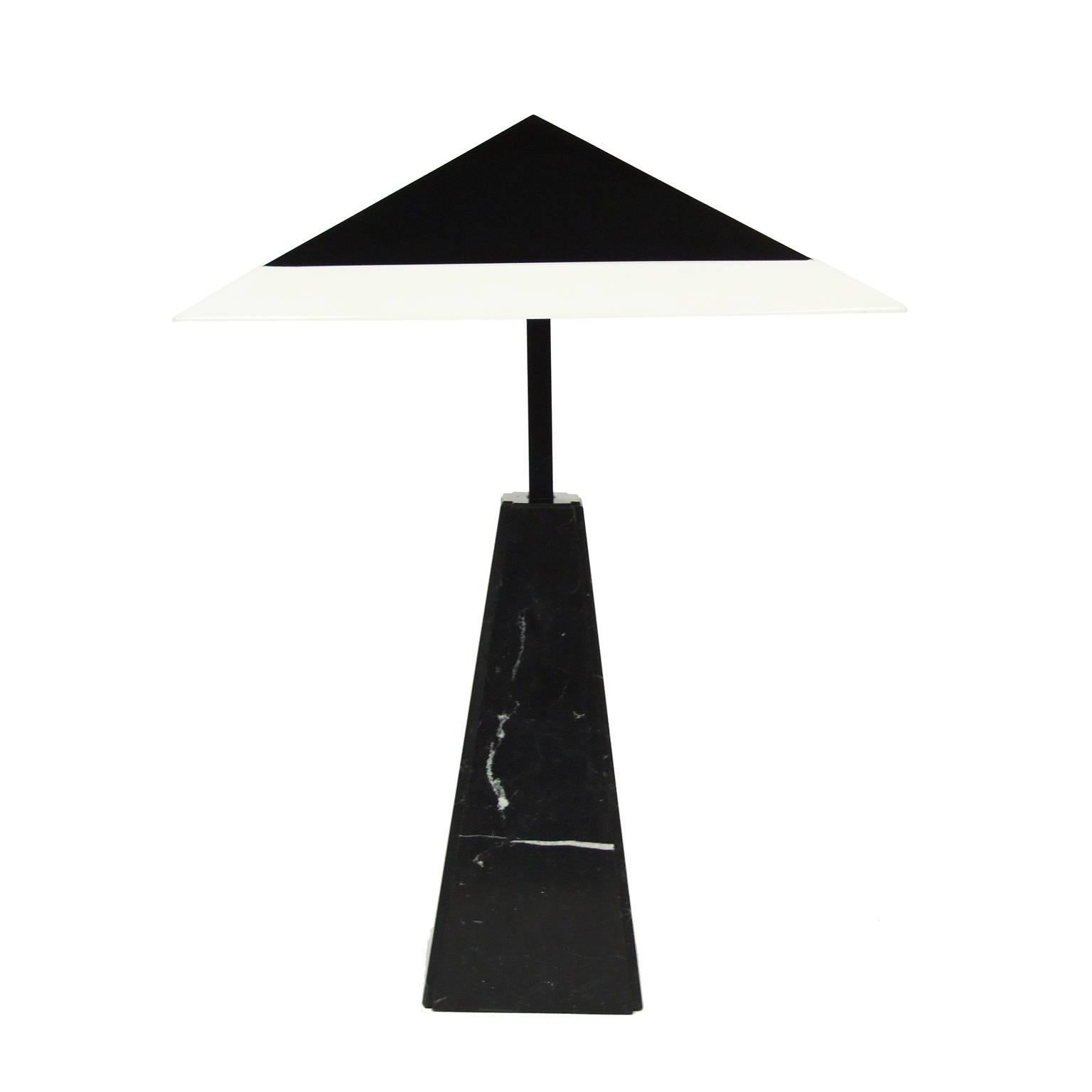 Original 1975 table lamp designed by Cini Boeri for Arteluce, Italy.

Portoro marble column with black enameled brass. White acrylic shade with a black metal diffuser.

Four bulb fittings.

Measures: H 96 cm x L 64 cm x W 64 cm.