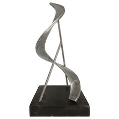 1970s Abstract Aluminum Sculpture on Black Wooden Base