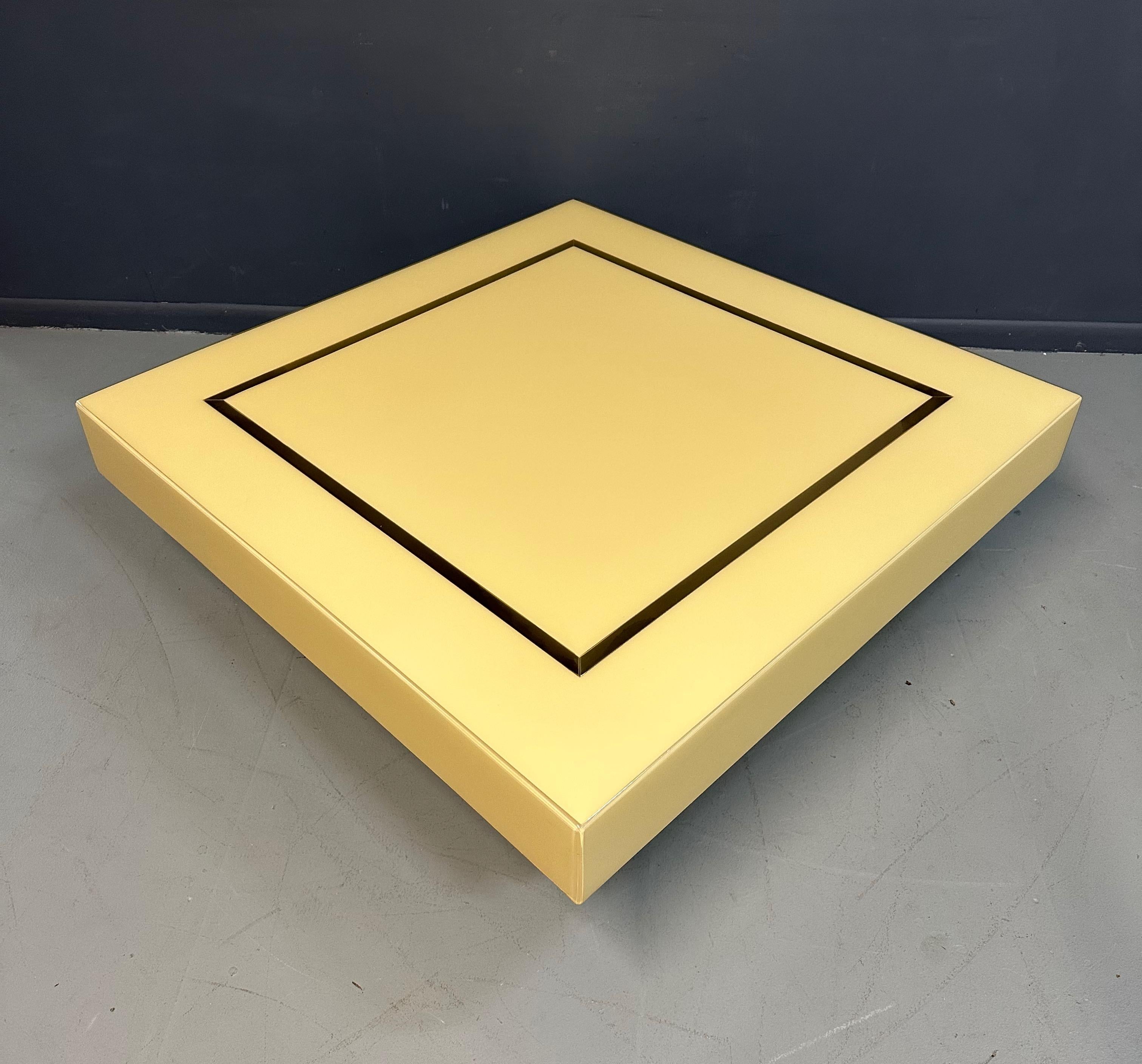 20th Century 1970s Acrylic Stepped Cream Colored Coffee Table with Brass Ribbon Inlay  For Sale