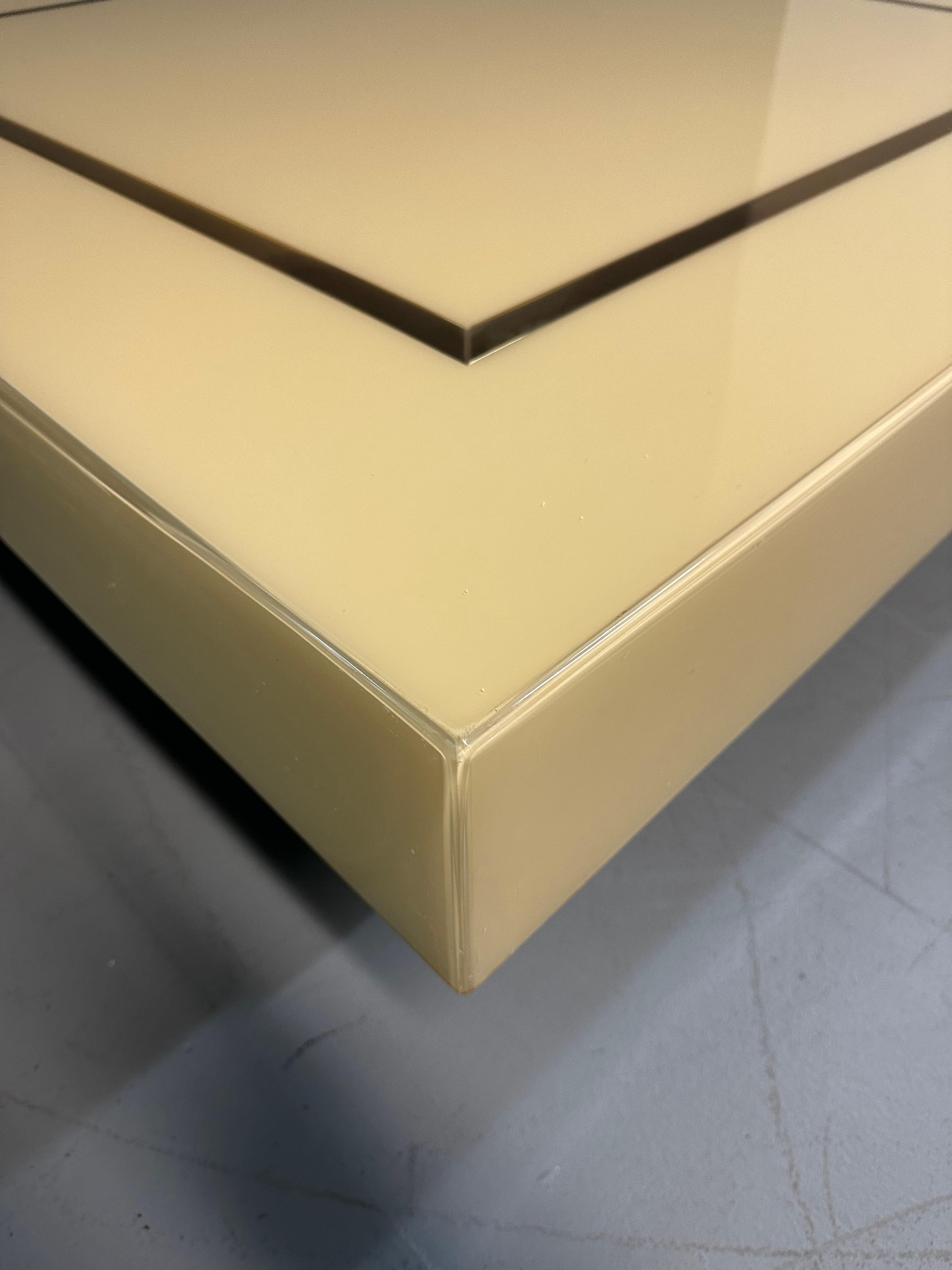 1970s Acrylic Stepped Cream Colored Coffee Table with Brass Ribbon Inlay  For Sale 3