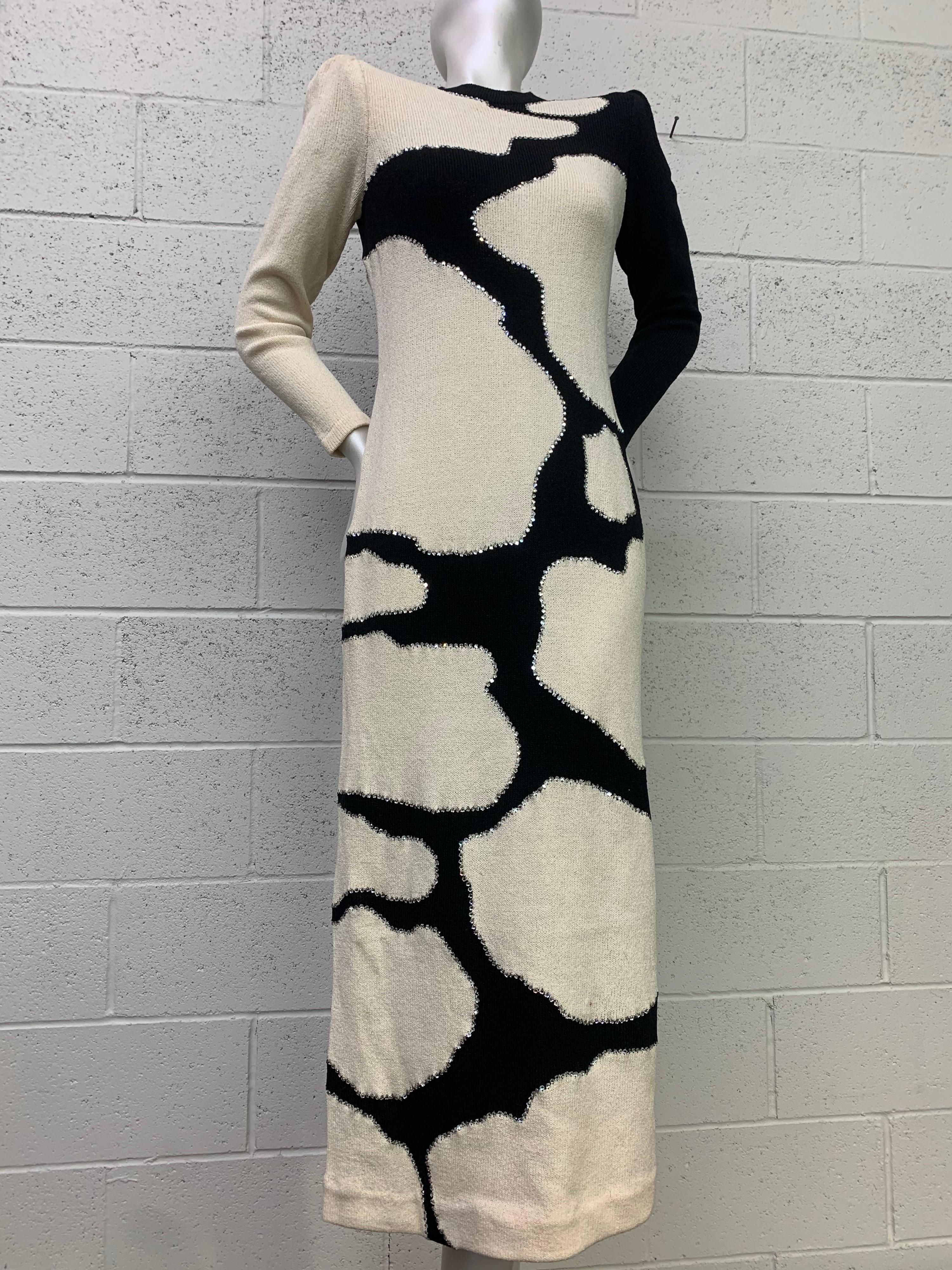 A fantastically graphic black and white Adolfo knit rayon maxi dress with coordinated black and white shoulder pads. Each black and white figure is edged in silver prong-set rhinestones! Deep side slit.  Remarkable! Size 6-8