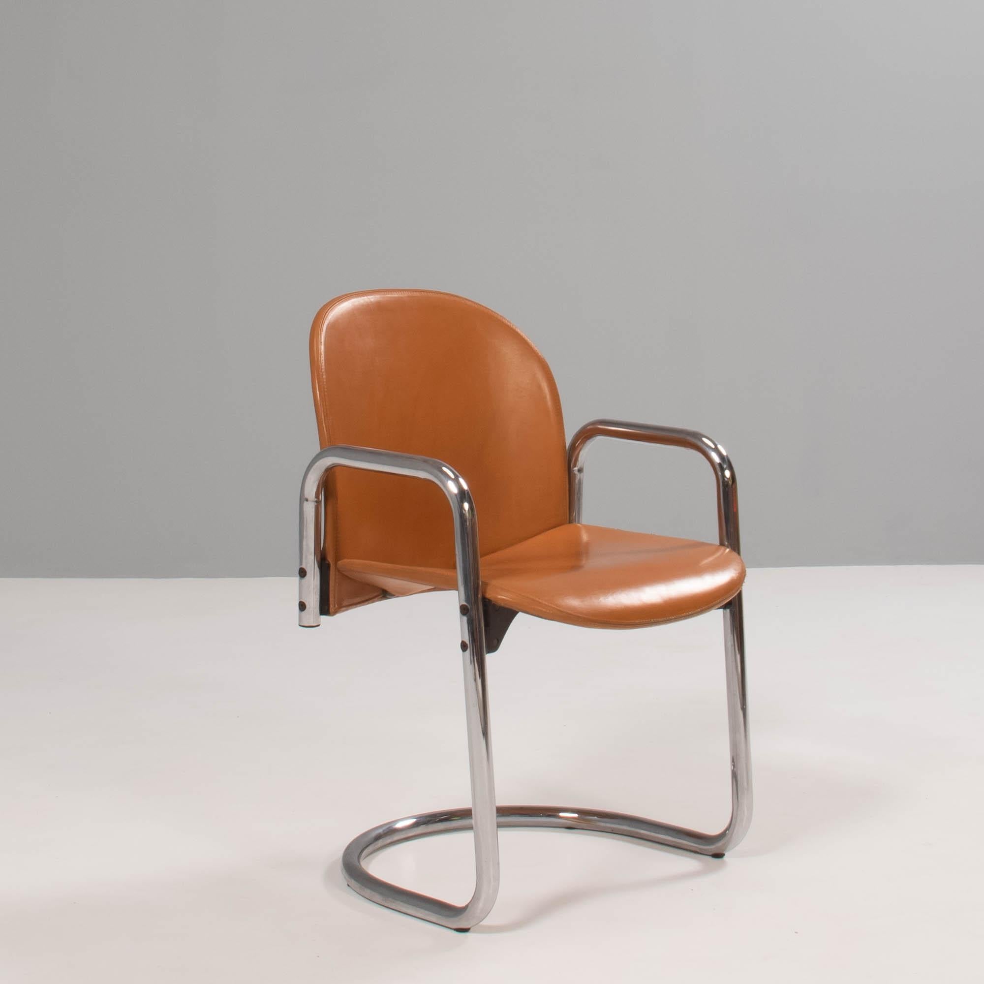 An incredible example of 1970s design, the Dialogo dining chairs was designed by Afra and Tobia Scarpa for B&B Italia in the 1970s.

The chair gives the illusion of being created from a single tubular chrome frame which forms the curved cantilever