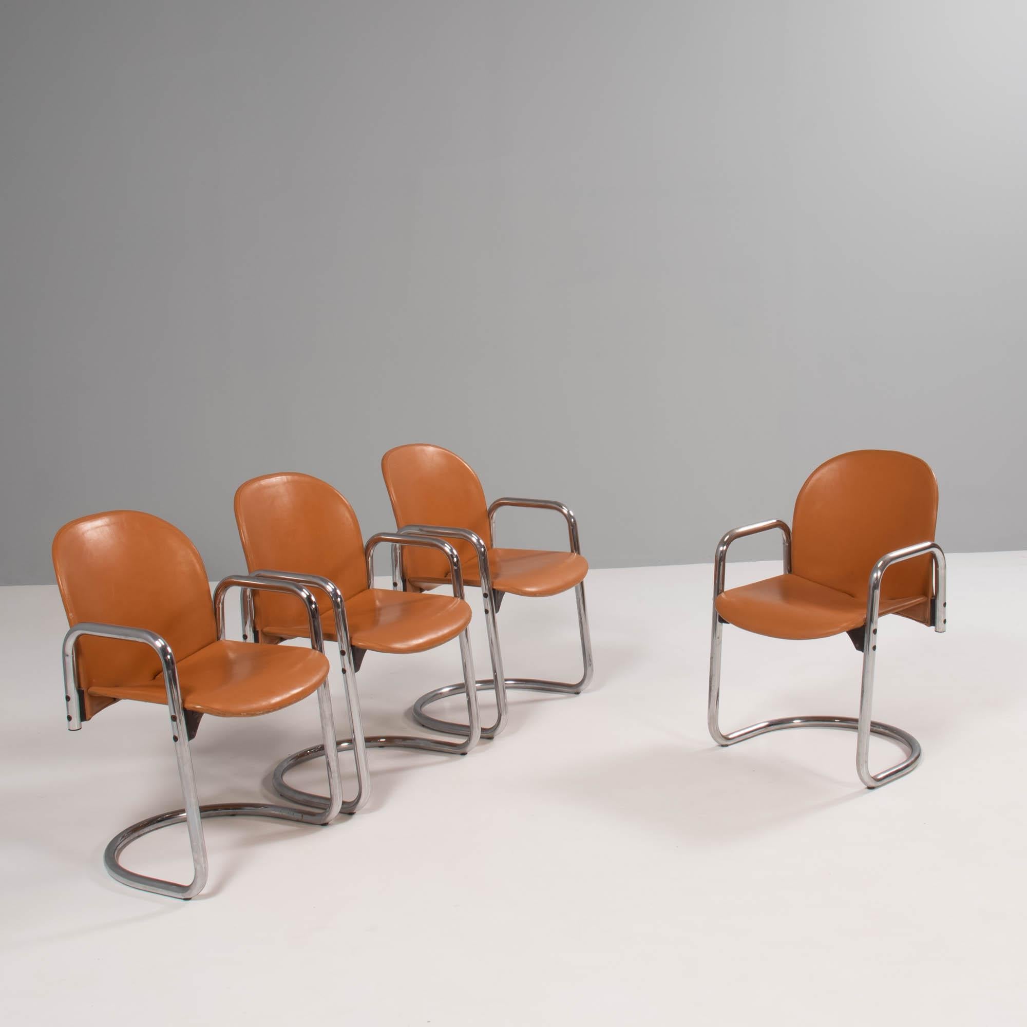An incredible example of 1970s design, these Dialogo dining chairs were designed by Afra & Tobia Scarpa for B&B Italia in the 1970s.

The chairs give the illusion of being created from a single tubular chrome frame which forms the curved