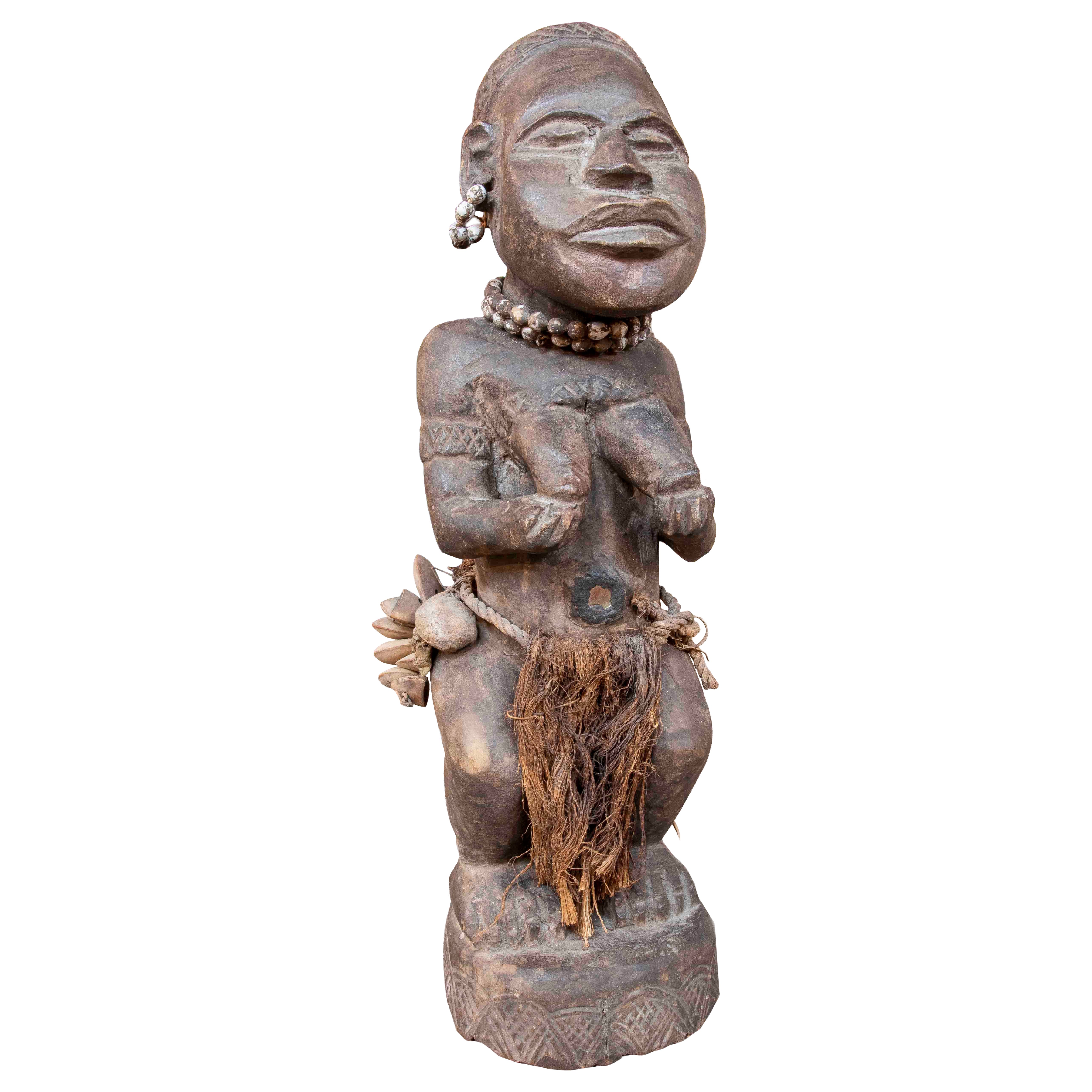 1970s African Figure Carved in Wood with Ritual Ornaments For Sale