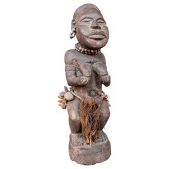 1970s African Figure Carved in Wood with Ritual Ornaments