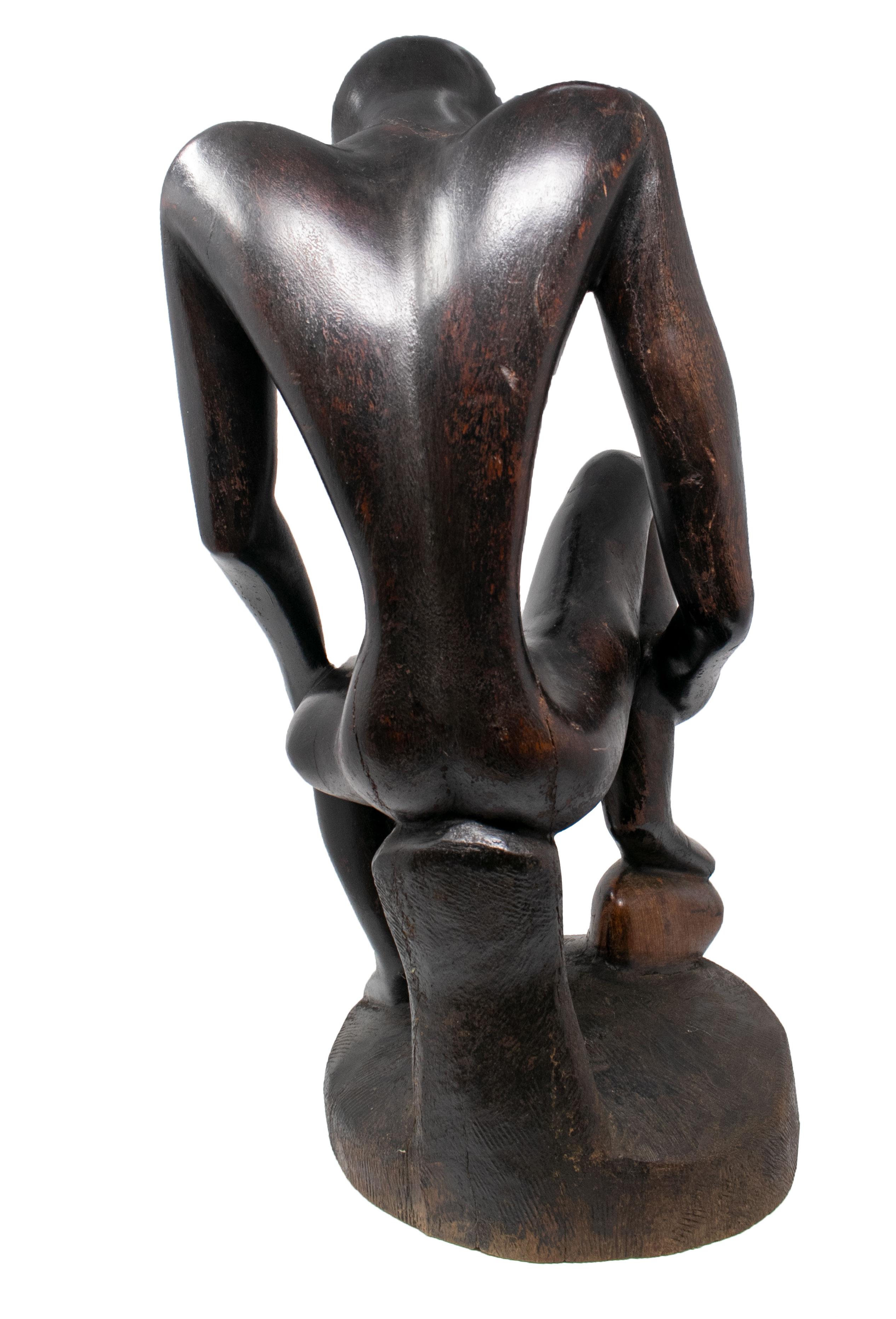 sitting man sculpture