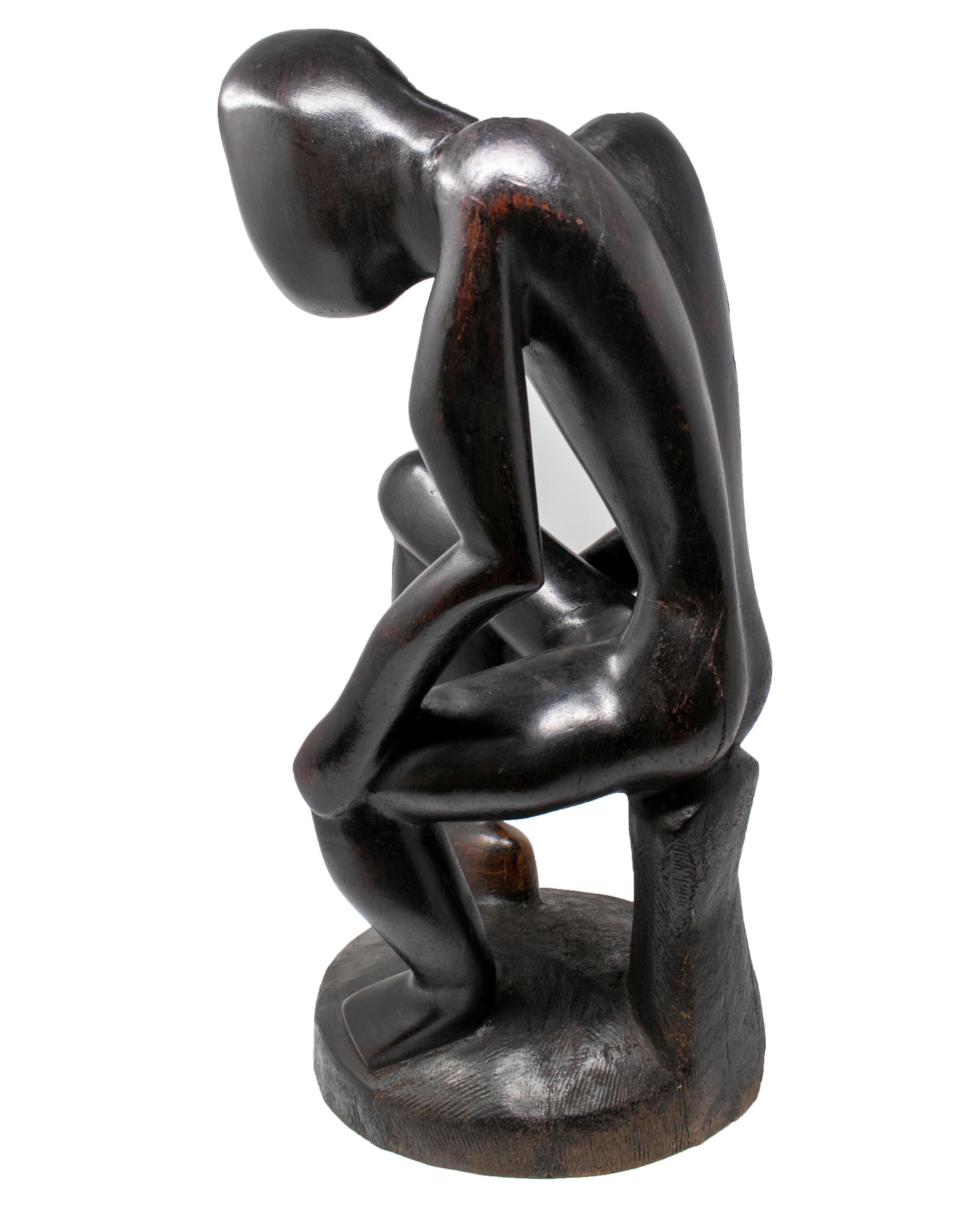 1970s African Hand Carved Wooden Sculpture of Sitting Man In Good Condition In Marbella, ES
