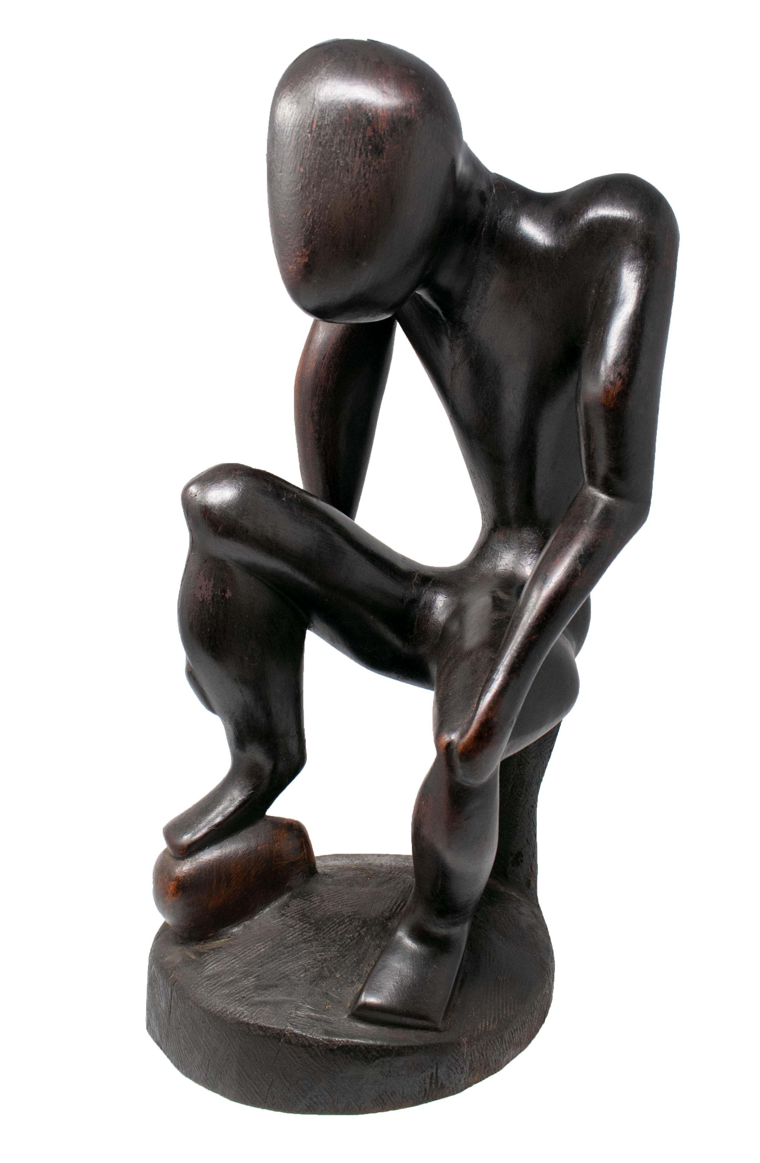 20th Century 1970s African Hand Carved Wooden Sculpture of Sitting Man