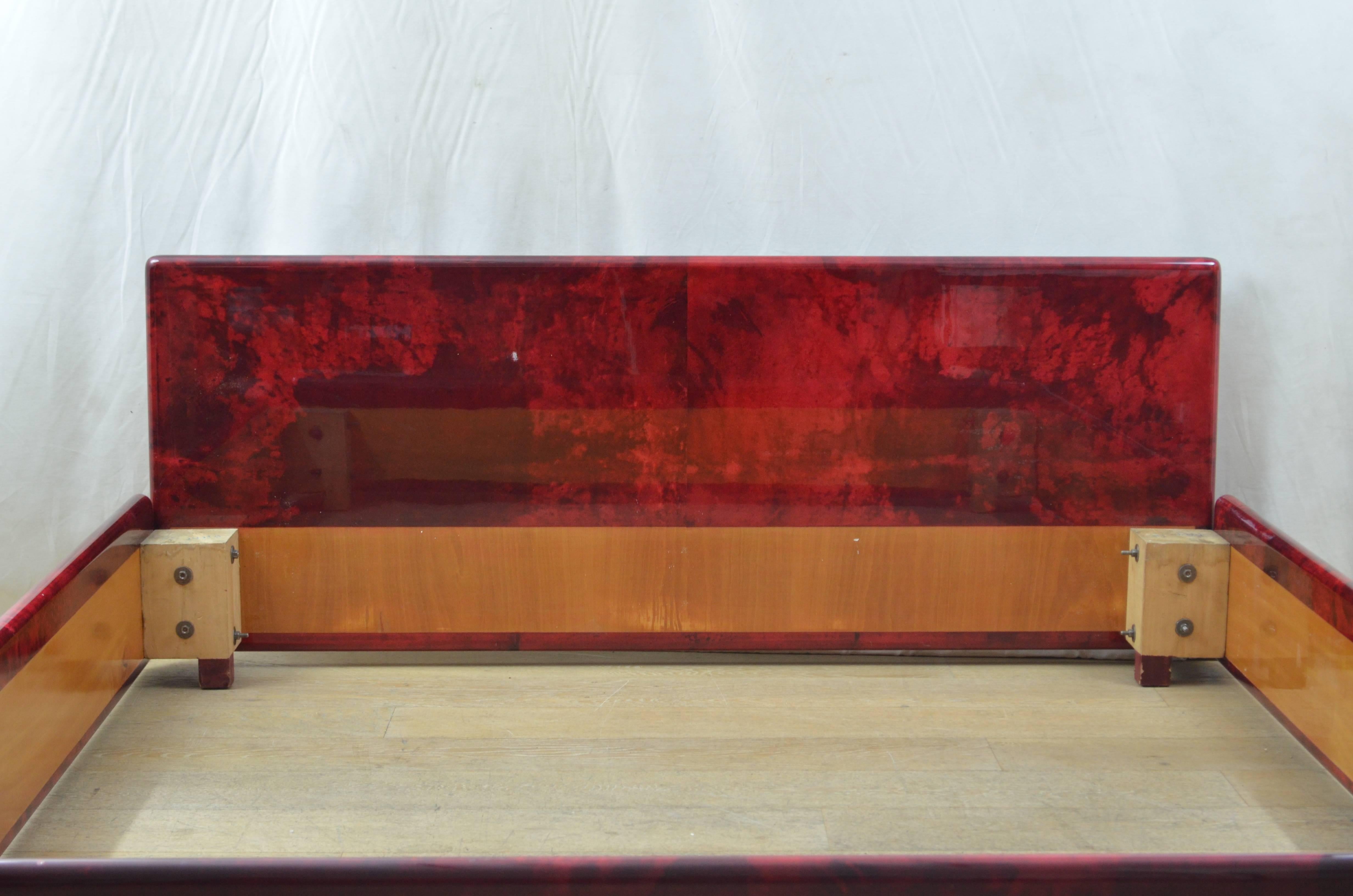 Entirely covered by red goatskin double bed, made circa end of 1970s in Italy by studio Aldo Tura. No restoration needed. The piece comes in exceptional conditions. Entirely dismountable.
On request we can provide a video of this item to enjoy it