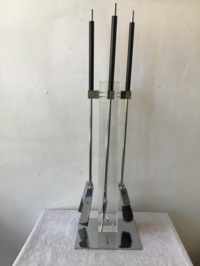 1970s Alessandro Albrizzi Lucite and polished chrome fireplace tool set.