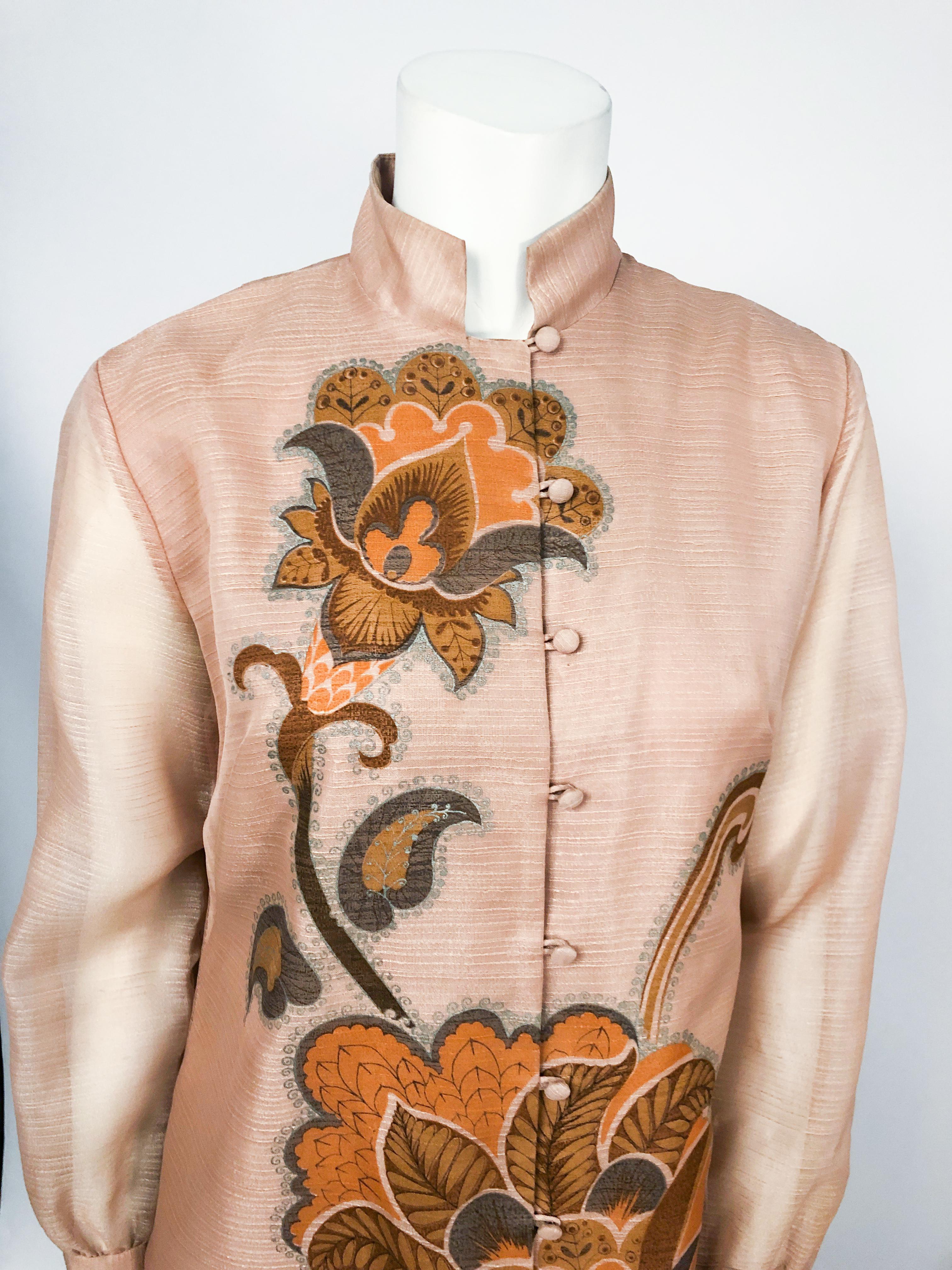 1970s Alfred Shaheen Tan Autumn Dress featuring a hand painted designs, nehru collar, unlined sleeves, cuffed sleeves, and drop waist.