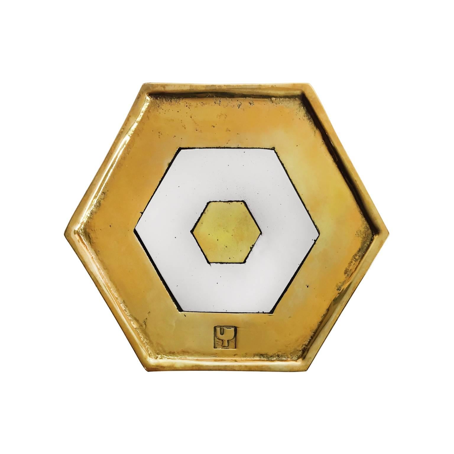 Brass and aluminium hexagonal Marrakech bottle mat by David Marshall. Spain, 1970s. 

Eight available, priced individually.