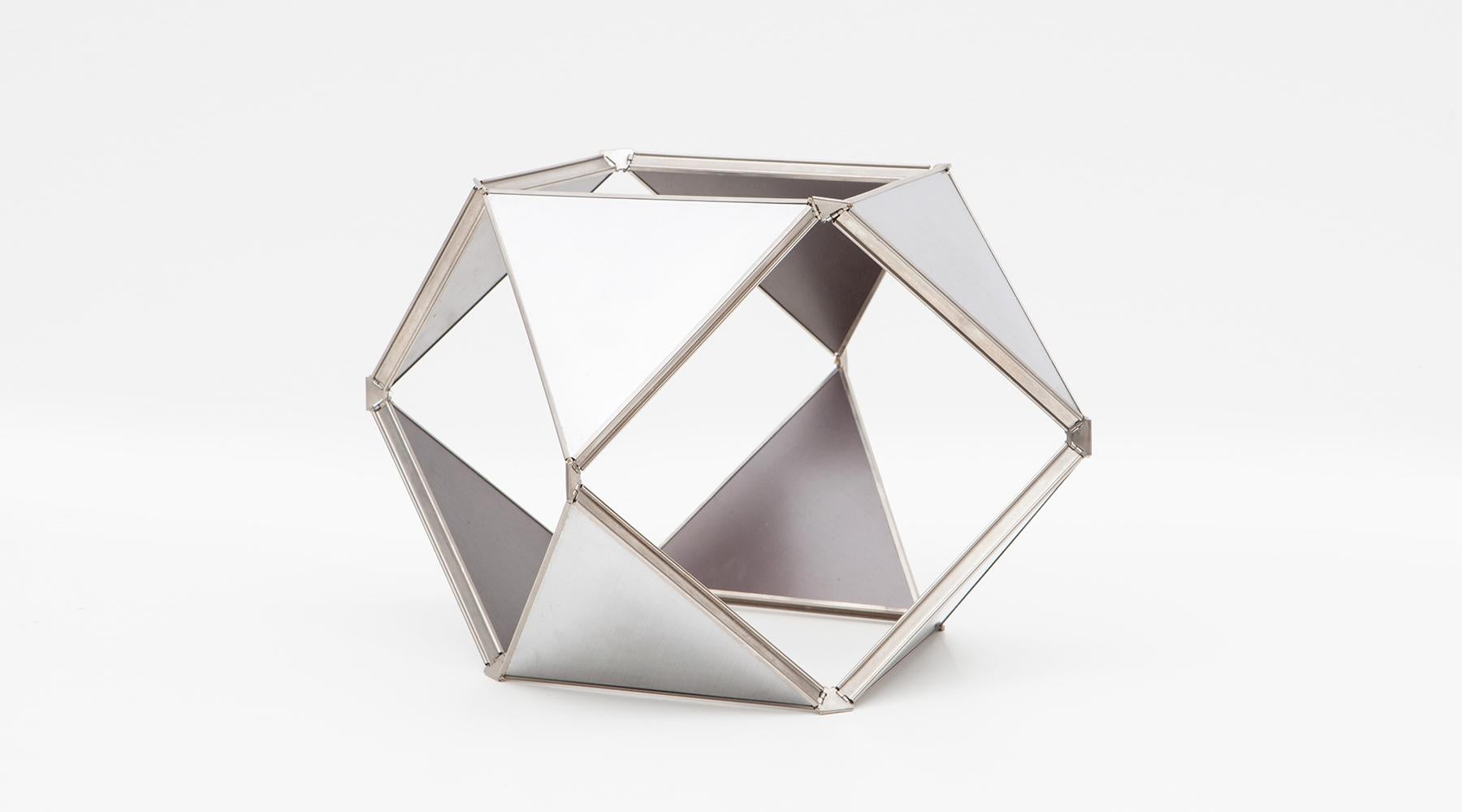 Aluminum sculpture by Buckminster Fuller, USA, 1976.

Signed Buckminster Fuller aluminum sculpture. Kinetic sculpture that compresses and expands. Signed to one panel on side. Buckminster Fuller (1895-1983) was an American architect and engineer