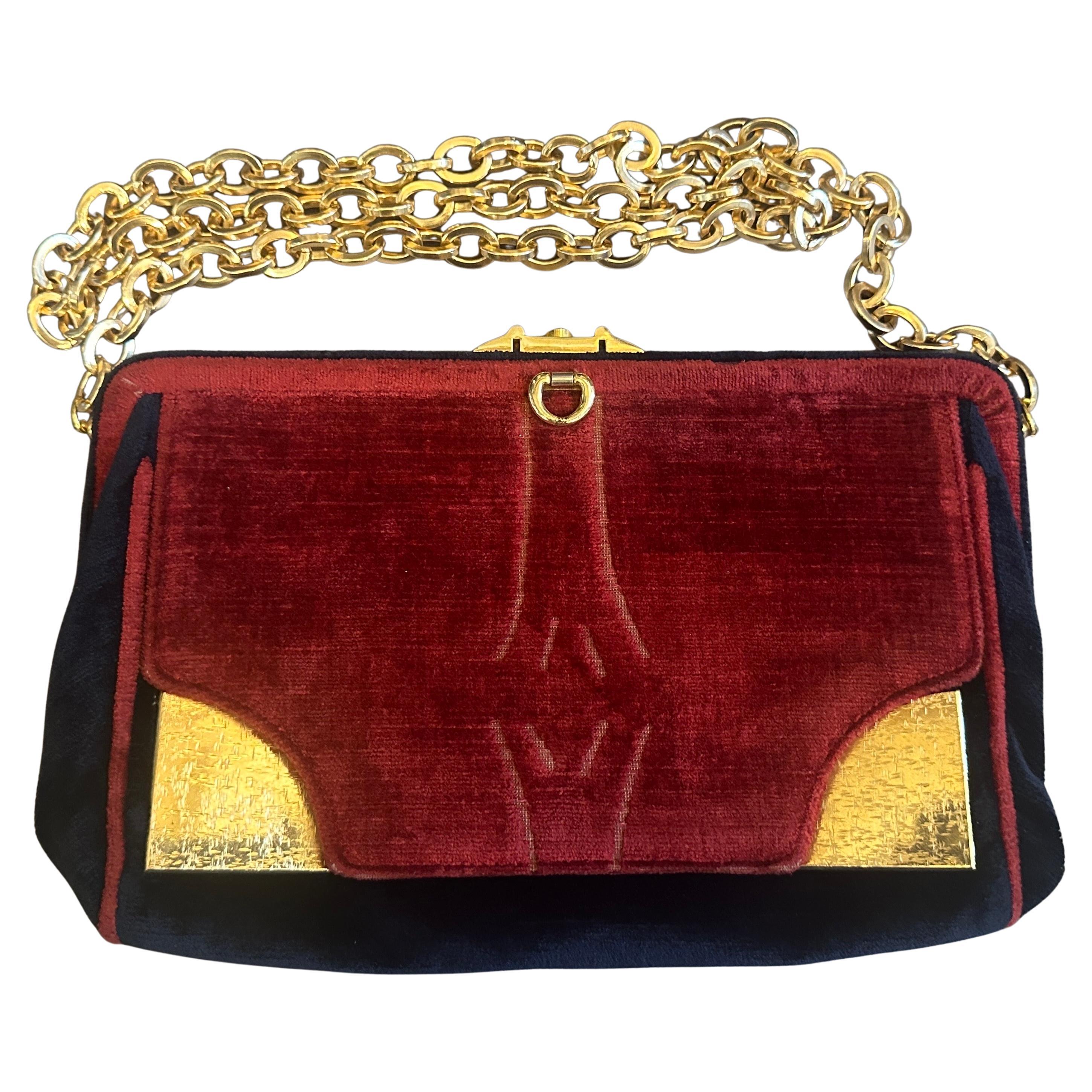 Incredibile borsa a tracolla italiana degli anni
70 in velluto blu e rosso e ottone