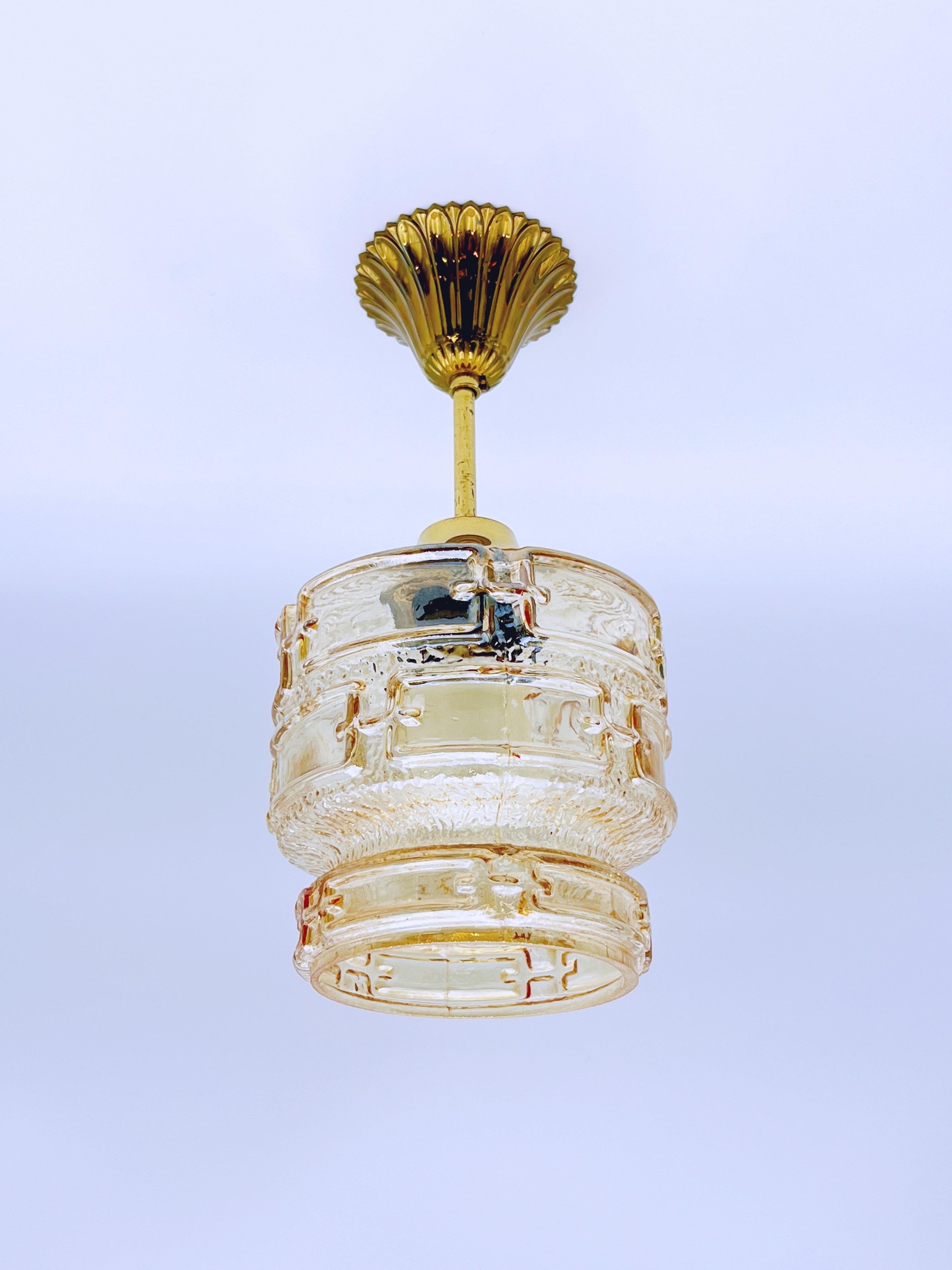 Mid-Century Modern 1970s Amber glass & brass pendant light For Sale