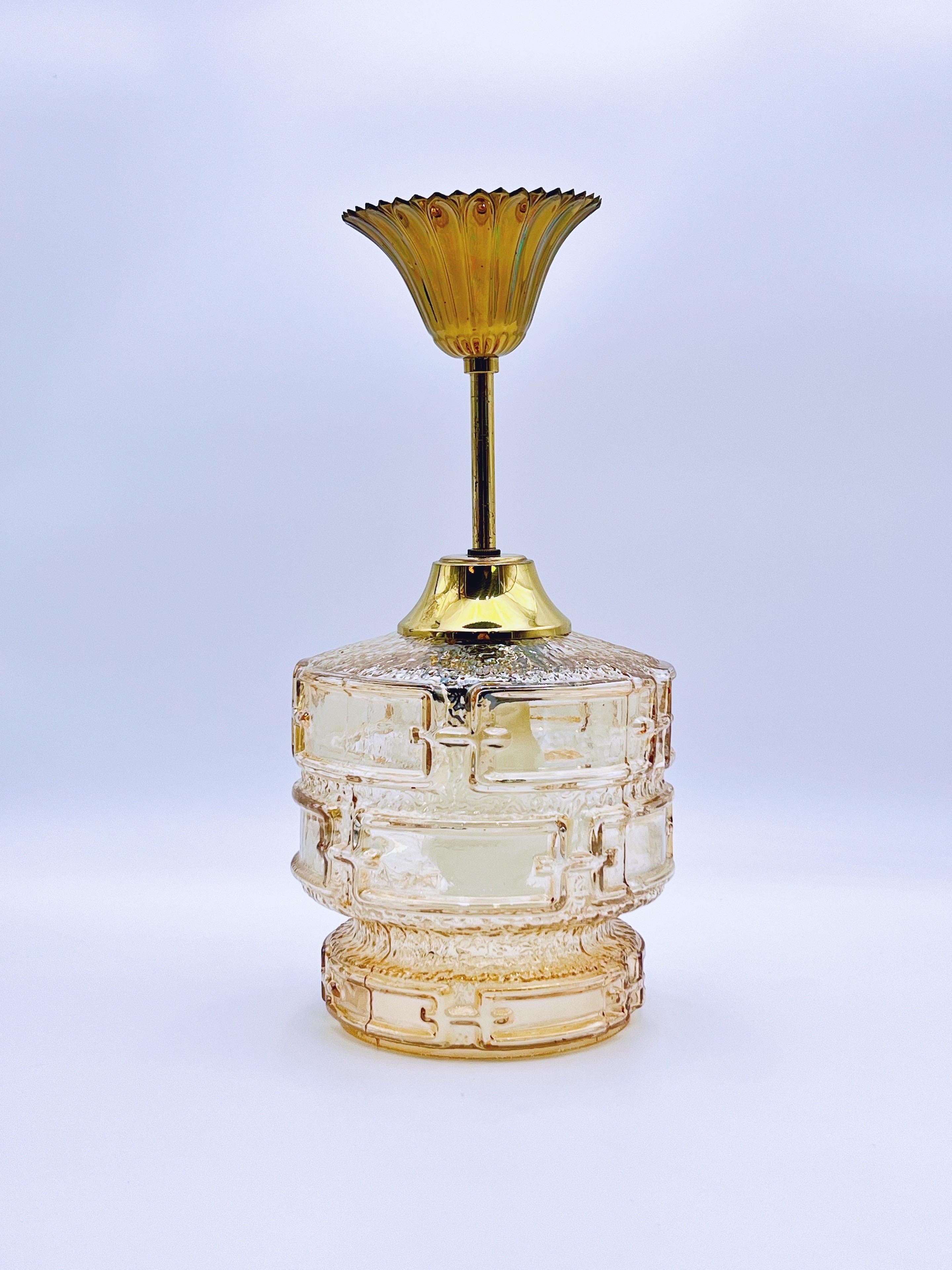 Hand-Crafted 1970s Amber glass & brass pendant light For Sale